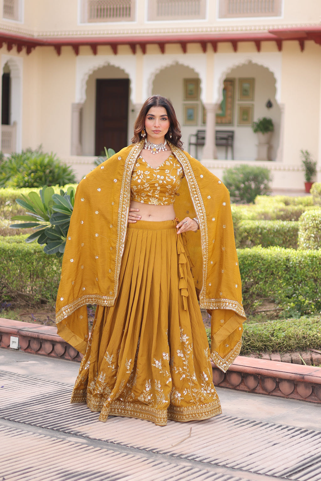 Ruvika mustard yellow Vichitra silk lehenga choli with sequins zari embroidered work