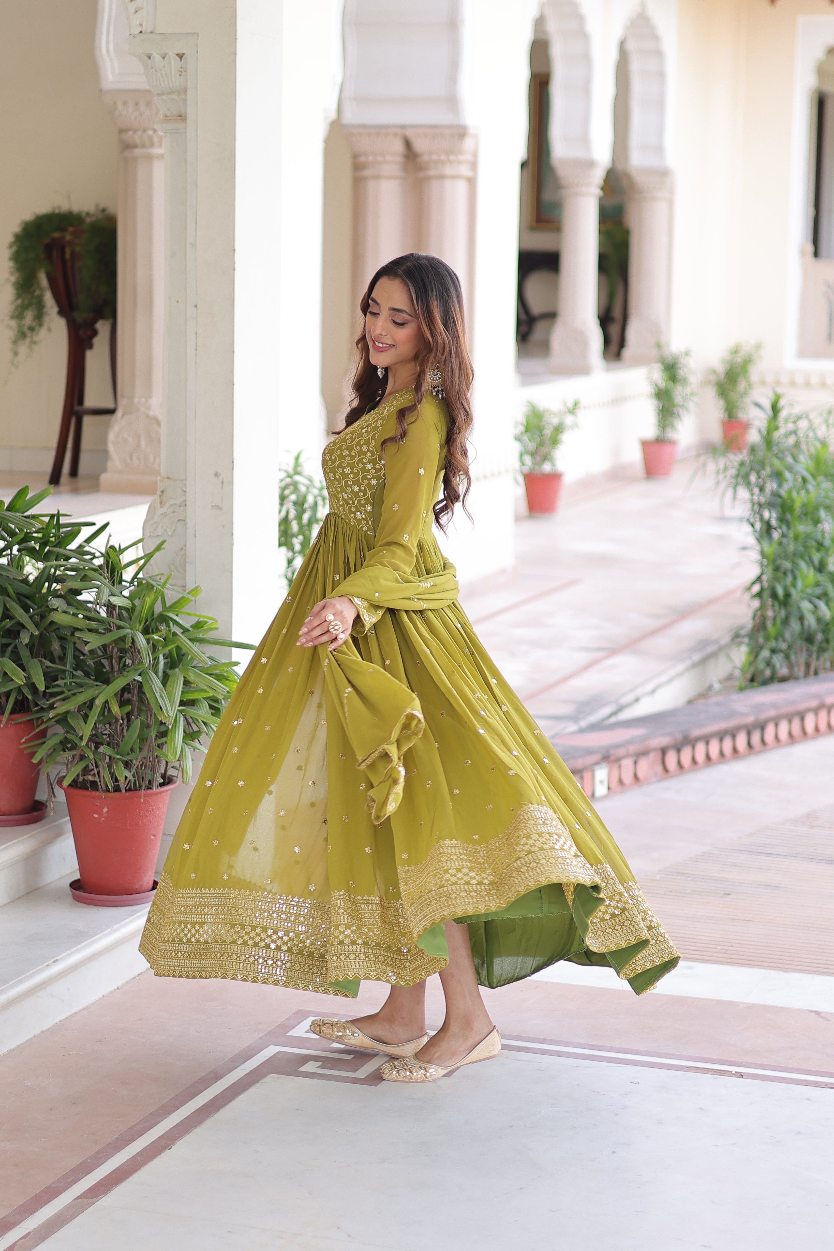 Aarini Green Color Faux Georgette Sequins Zari Embroidered Gown with Dupatta