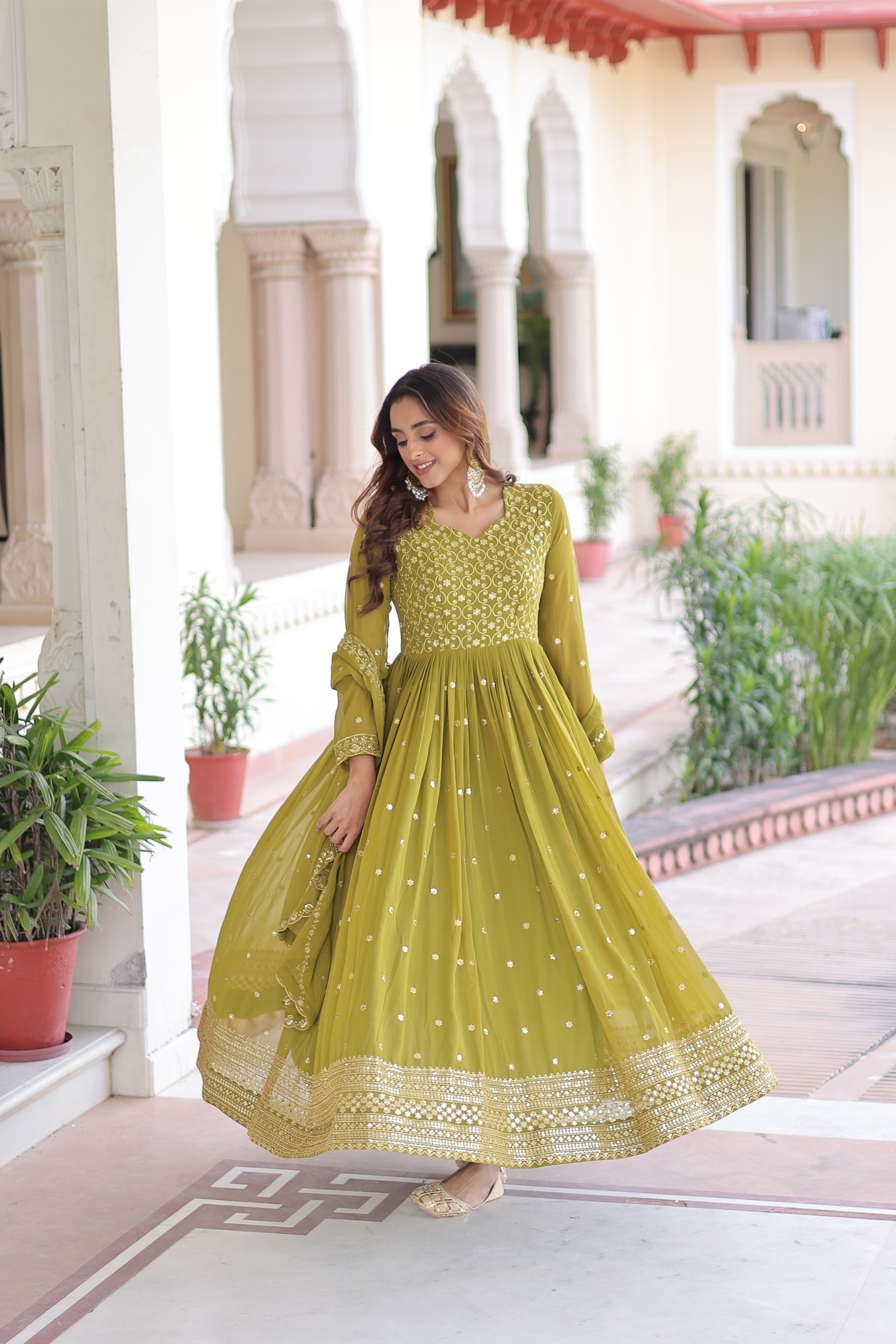 Aarini Green Color Faux Georgette Sequins Zari Embroidered Gown with Dupatta