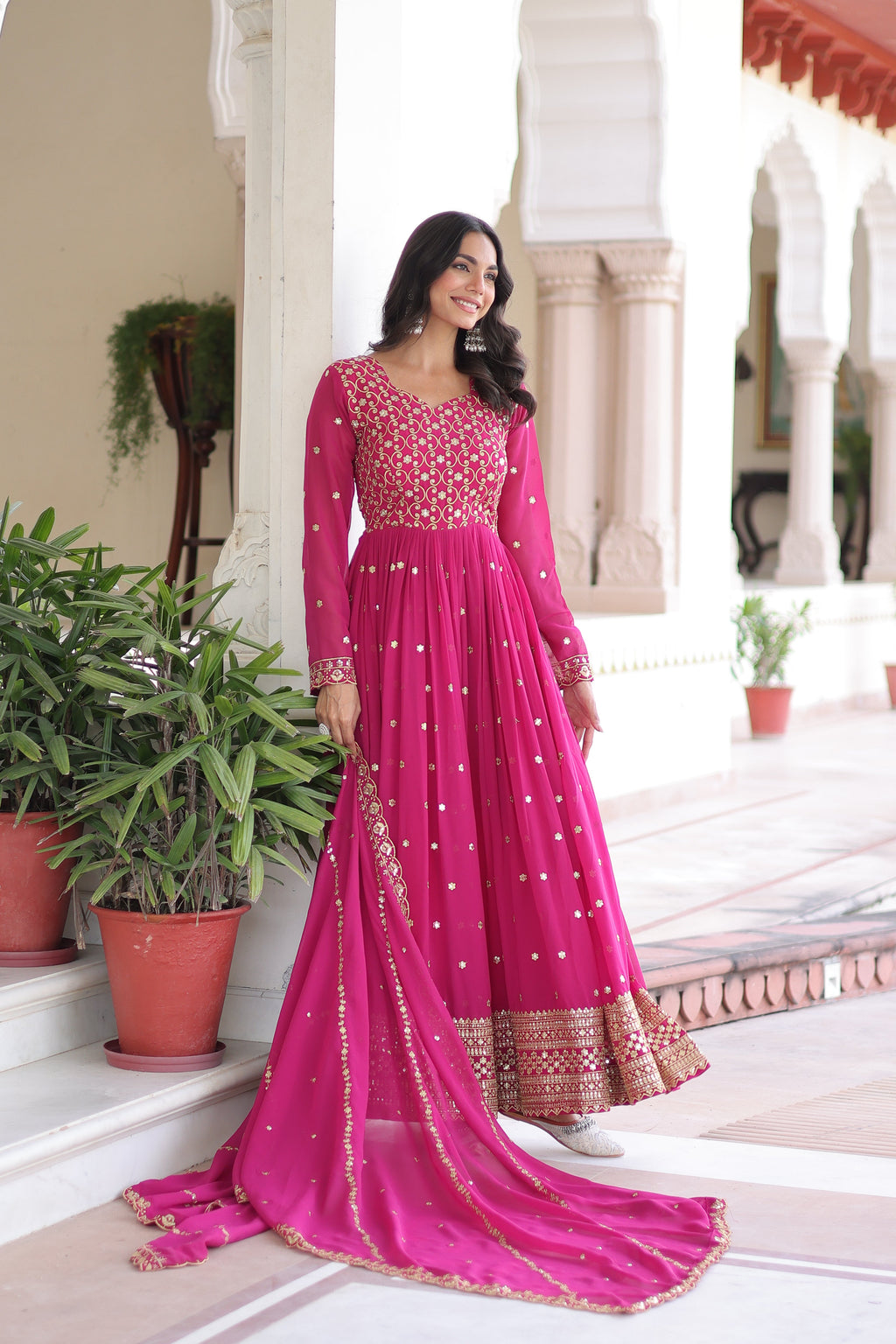 Aarini pink faux georgette gown with sequins zari embroidered work and dupatta