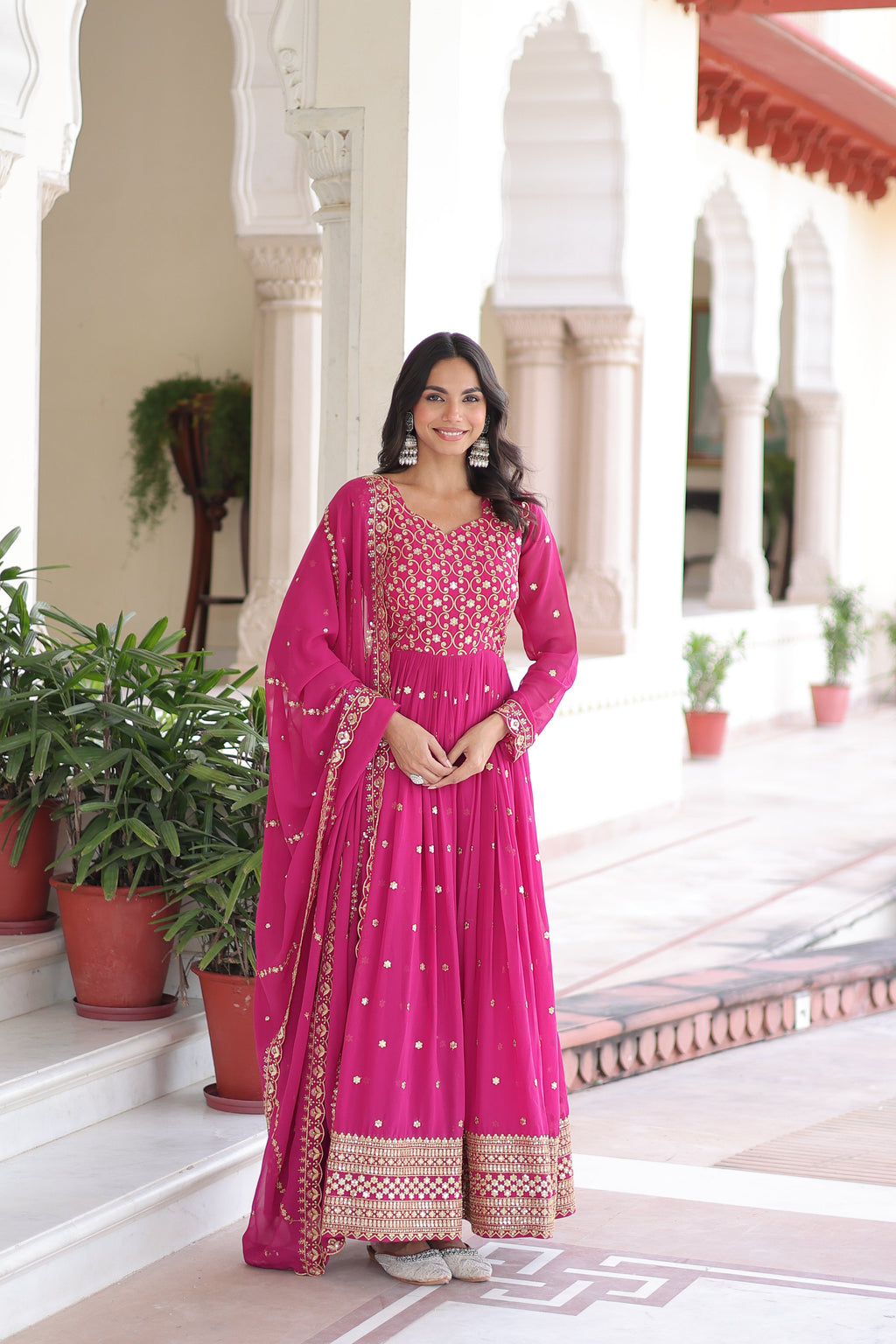 Aarini pink faux georgette gown with sequins zari embroidered work and dupatta