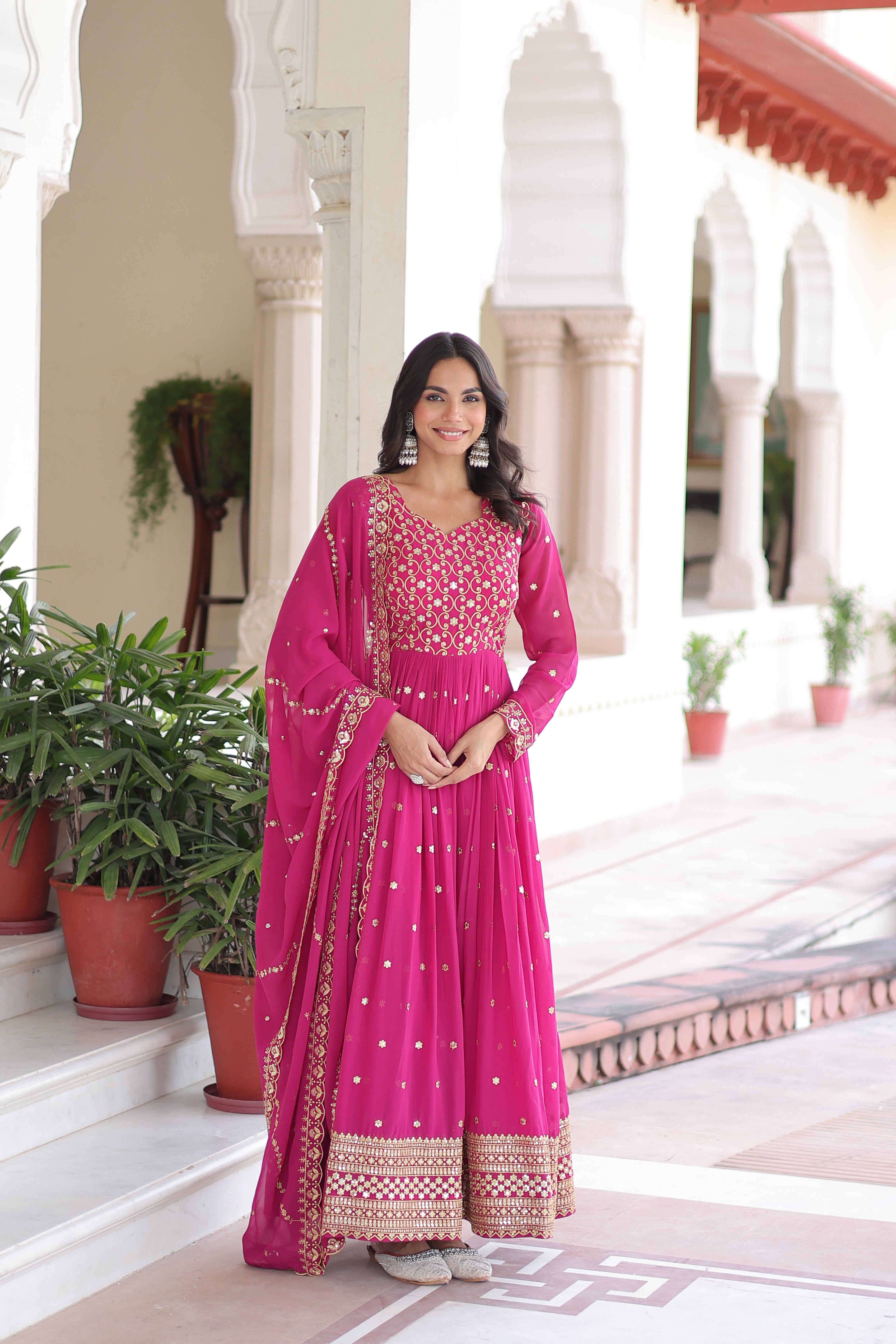 Aarini pink faux georgette gown with sequins zari embroidered work and dupatta
