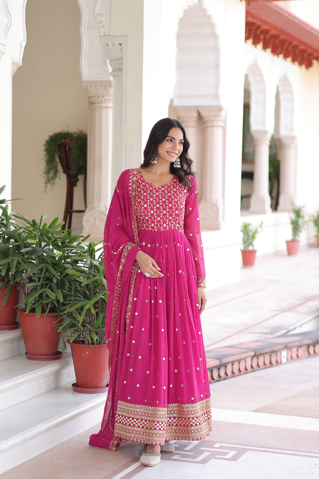 Aarini pink faux georgette gown with sequins zari embroidered work and dupatta
