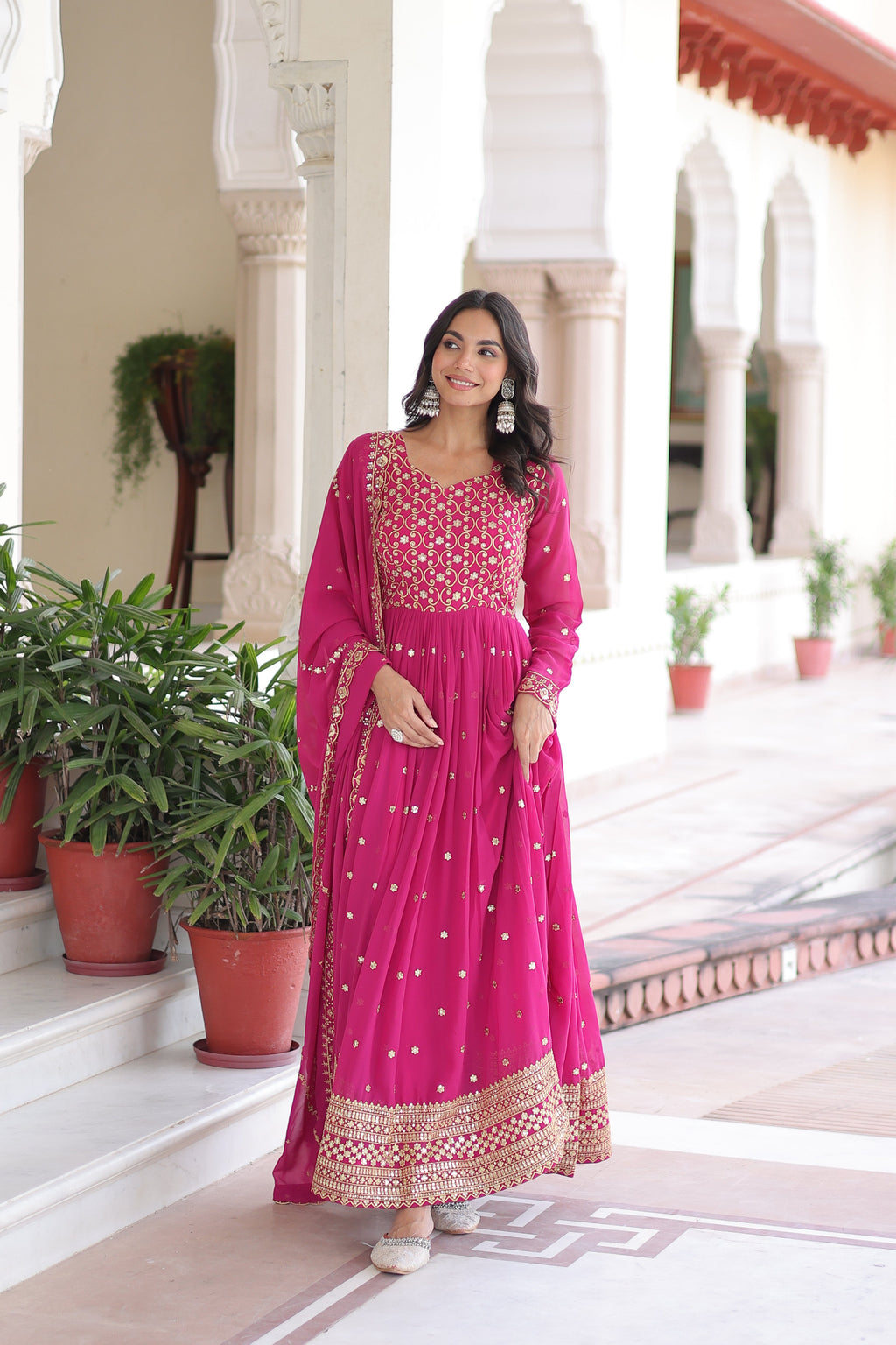 Aarini pink faux georgette gown with sequins zari embroidered work and dupatta