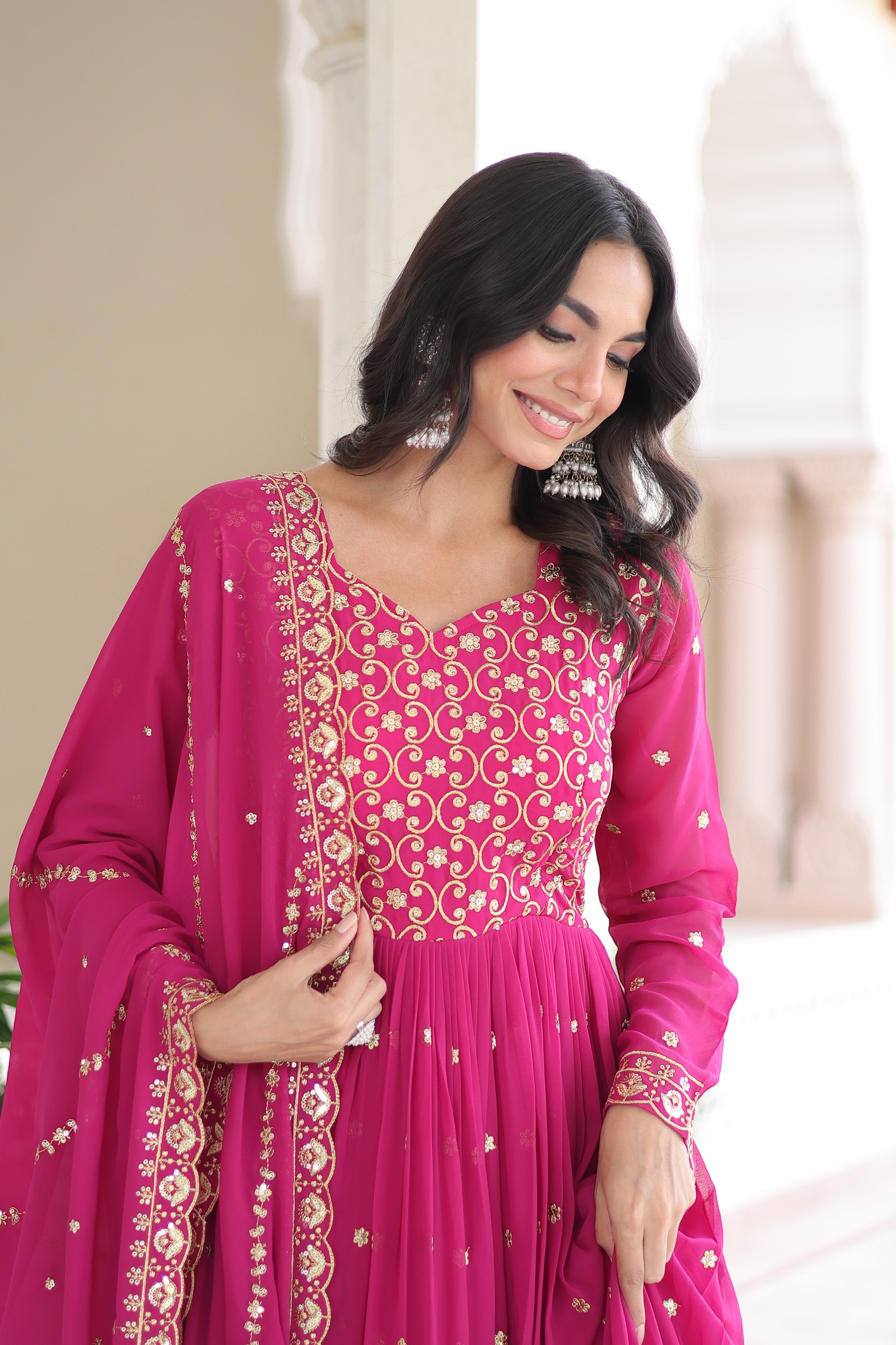 Aarini pink faux georgette gown with sequins zari embroidered work and dupatta