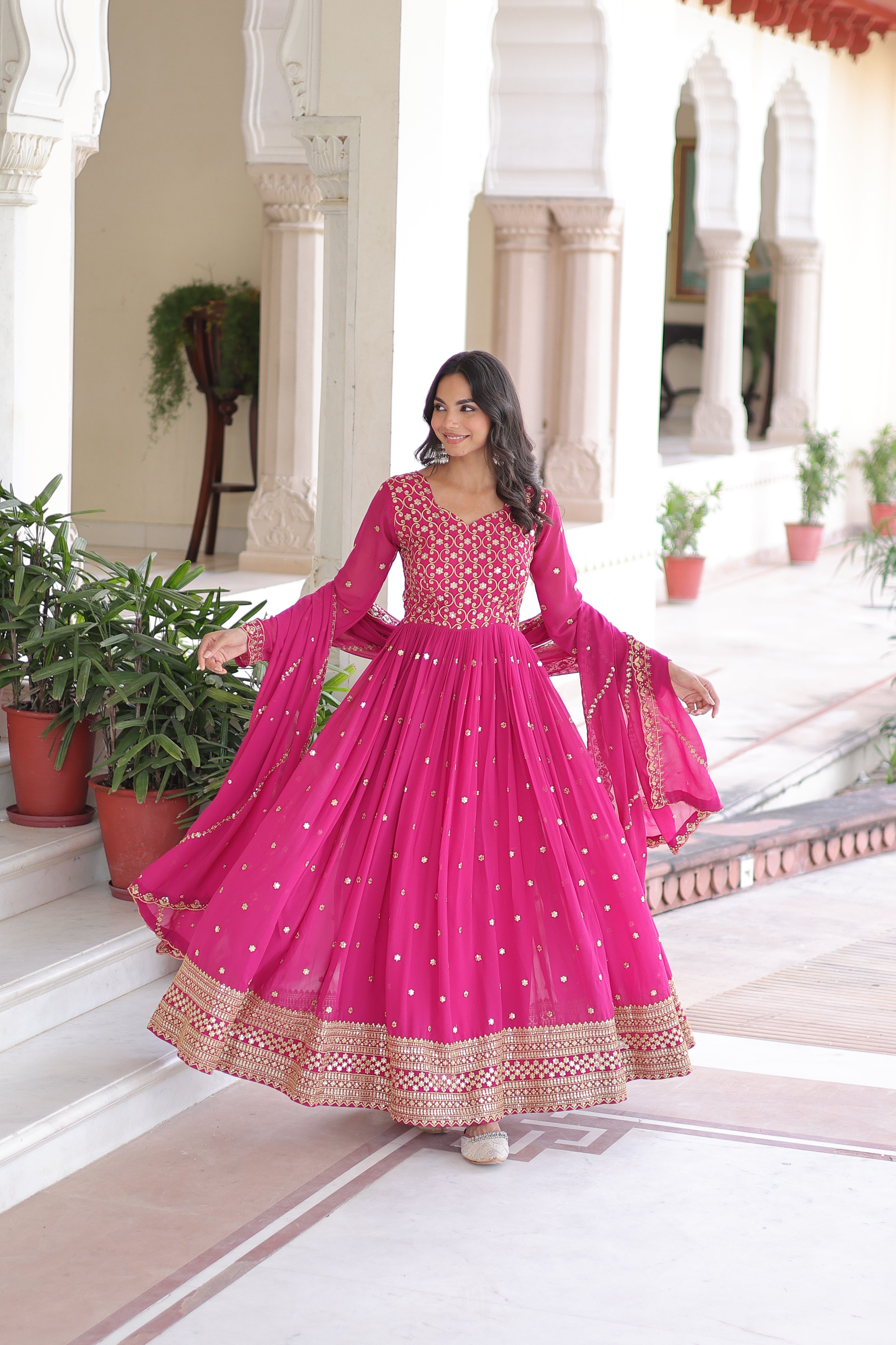 Aarini pink faux georgette gown with sequins zari embroidered work and dupatta