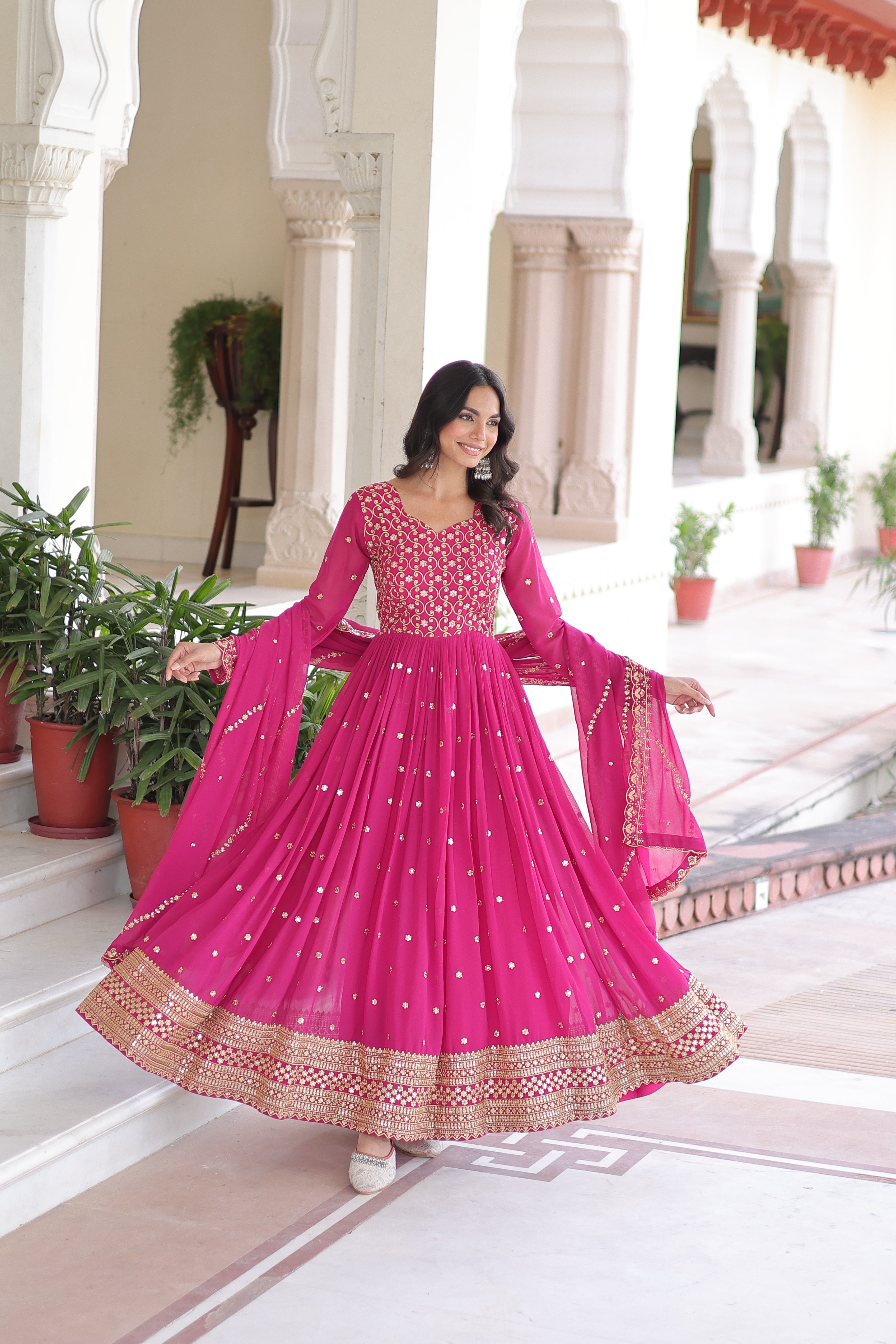 Aarini pink faux georgette gown with sequins zari embroidered work and dupatta