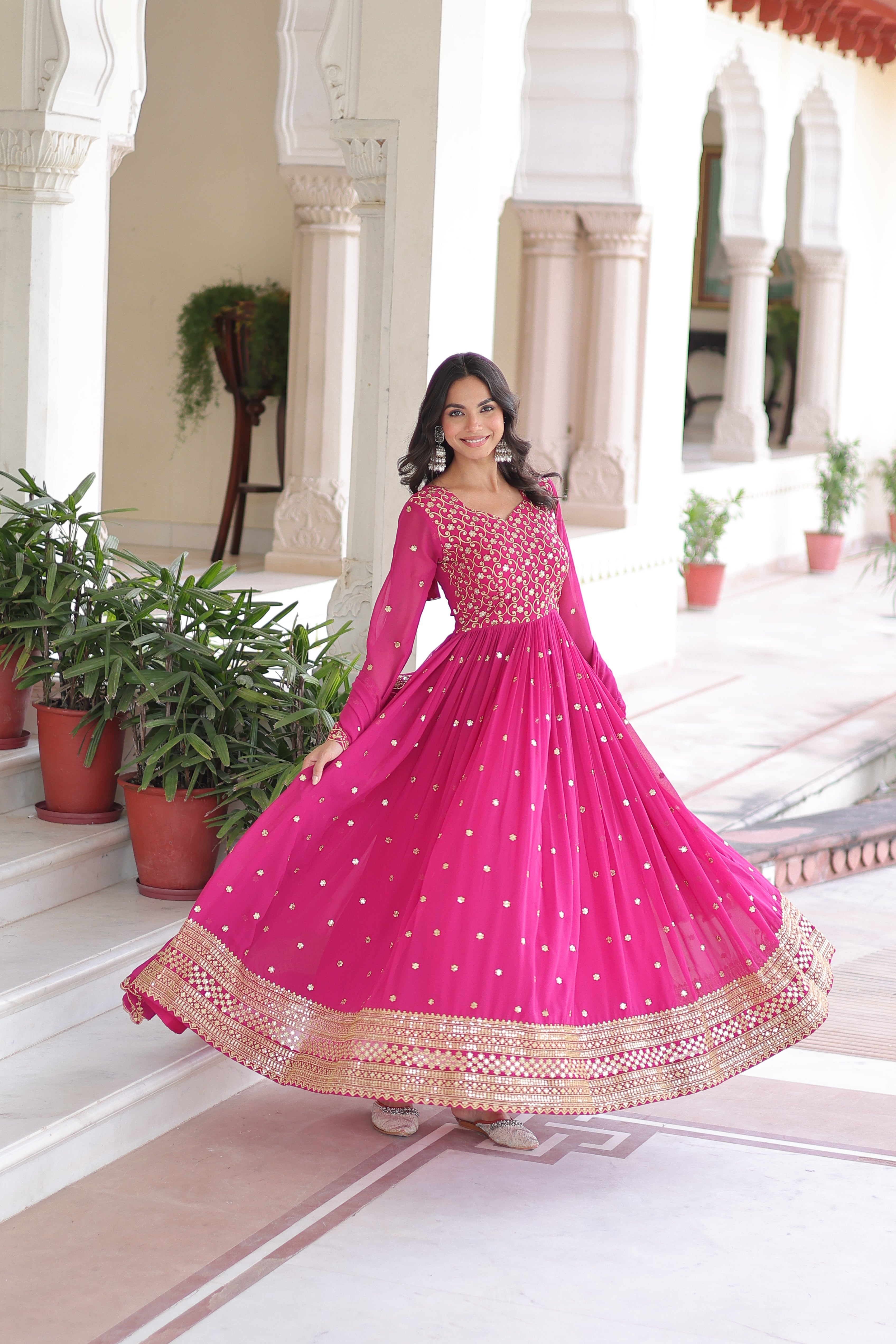 Aarini pink faux georgette gown with sequins zari embroidered work and dupatta