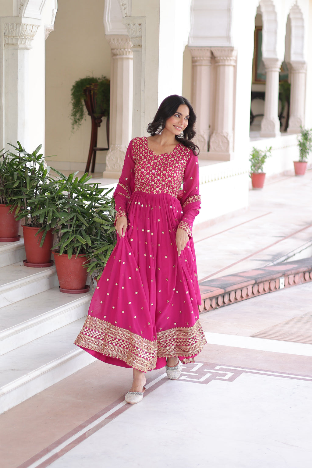 Aarini pink faux georgette gown with sequins zari embroidered work and dupatta