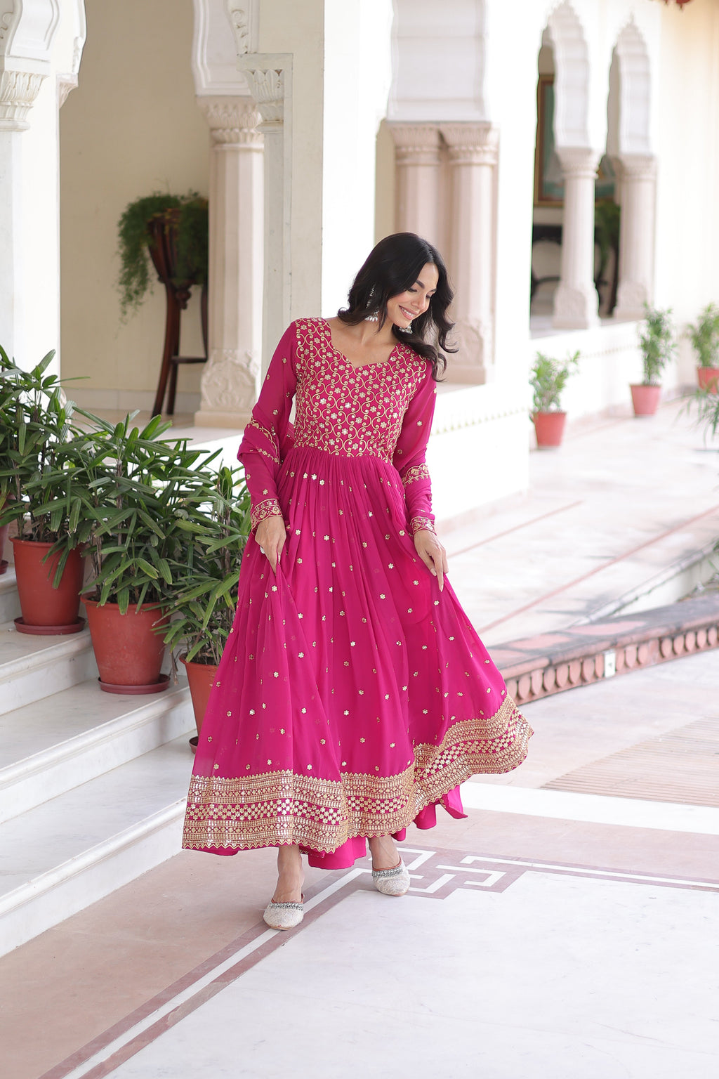 Aarini pink faux georgette gown with sequins zari embroidered work and dupatta