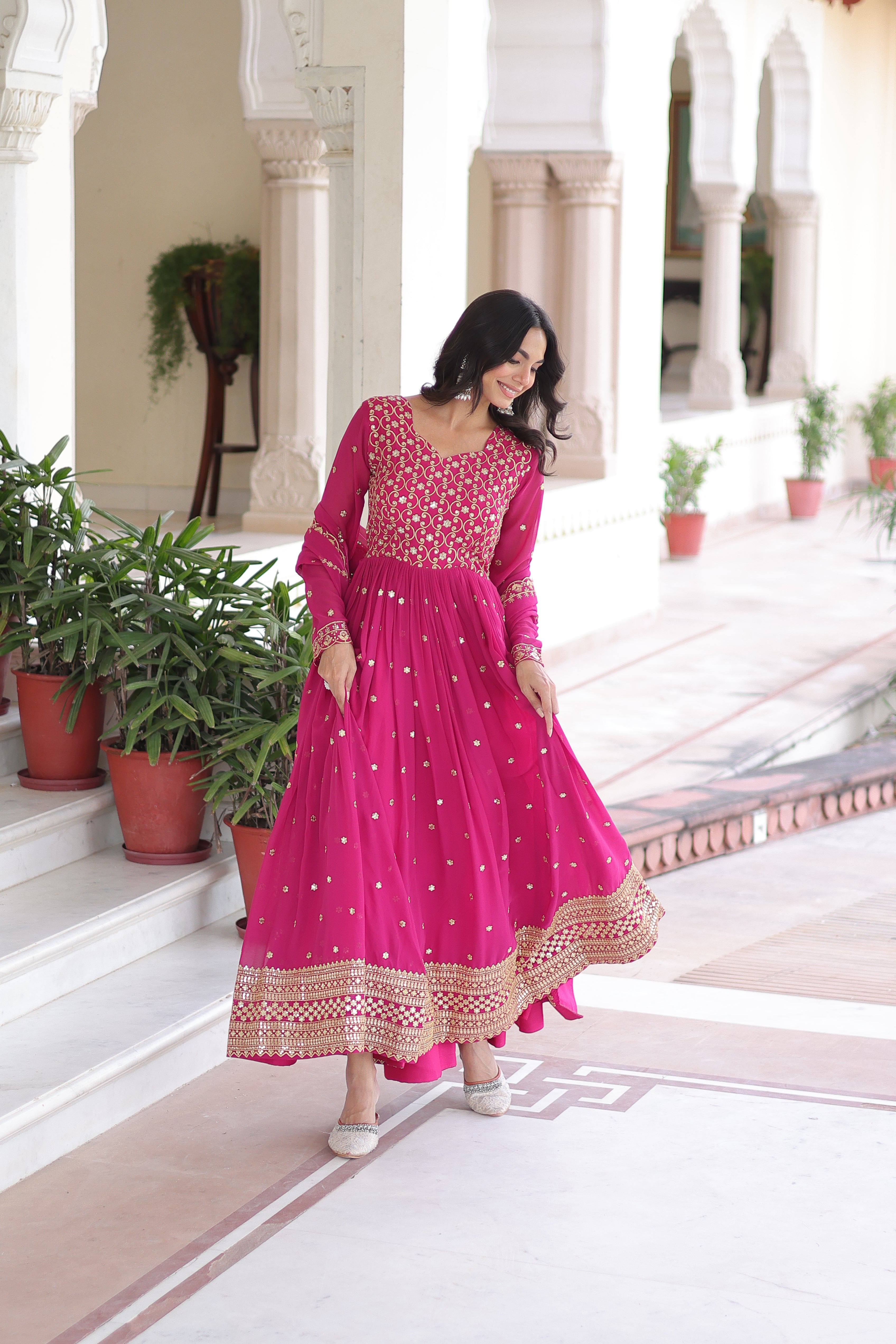 Aarini pink faux georgette gown with sequins zari embroidered work and dupatta