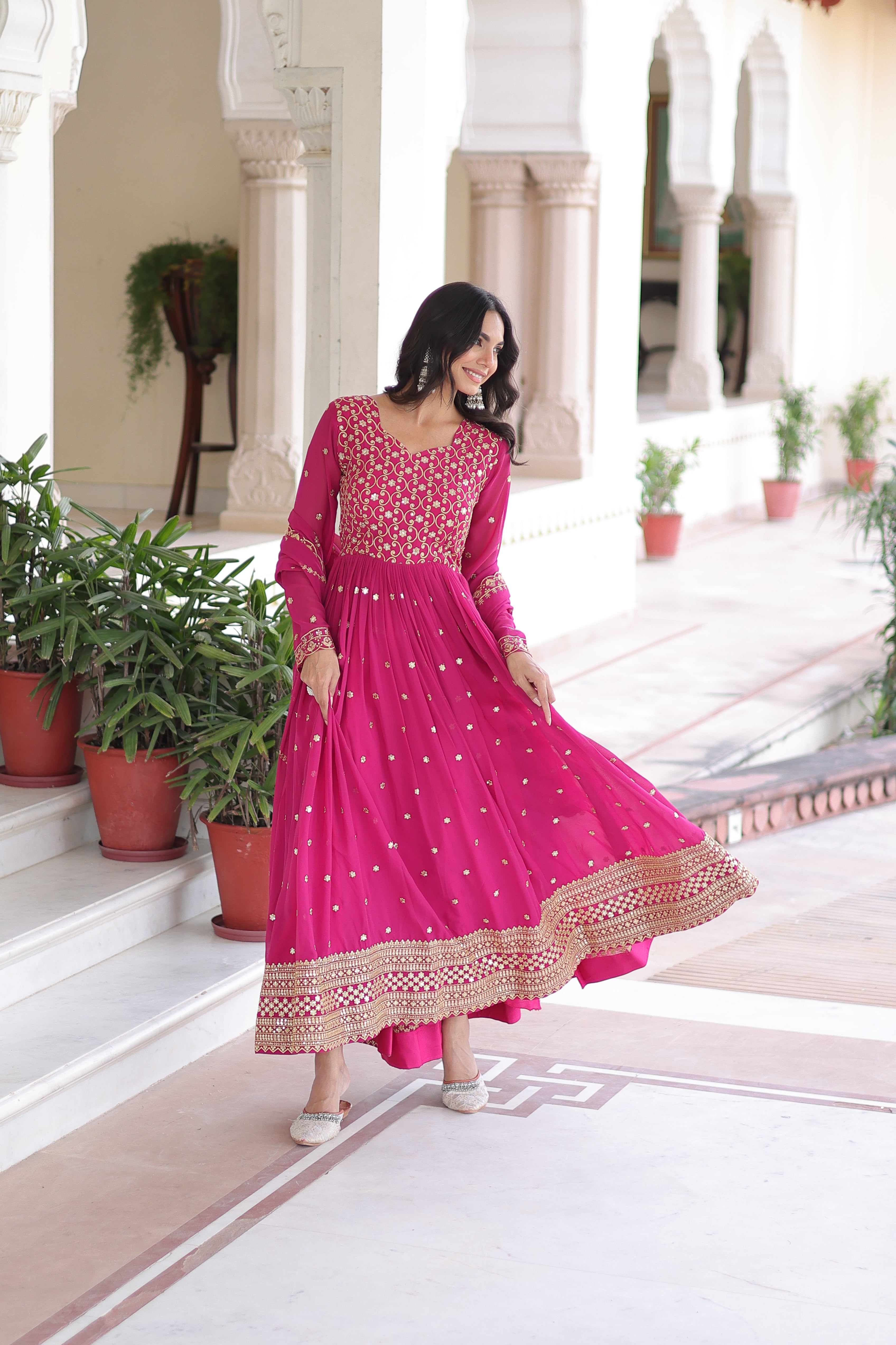 Aarini pink faux georgette gown with sequins zari embroidered work and dupatta