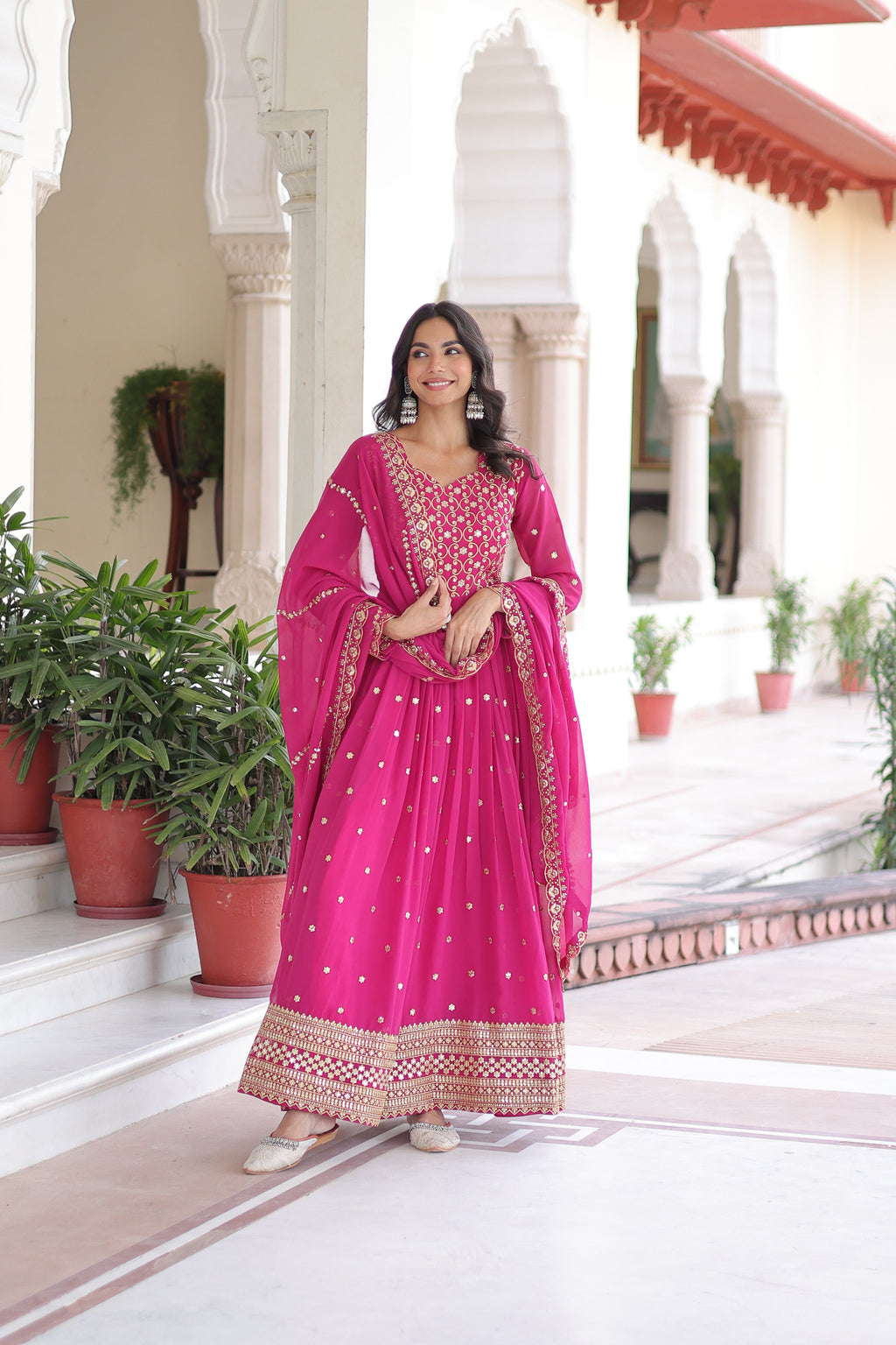 Aarini pink faux georgette gown with sequins zari embroidered work and dupatta