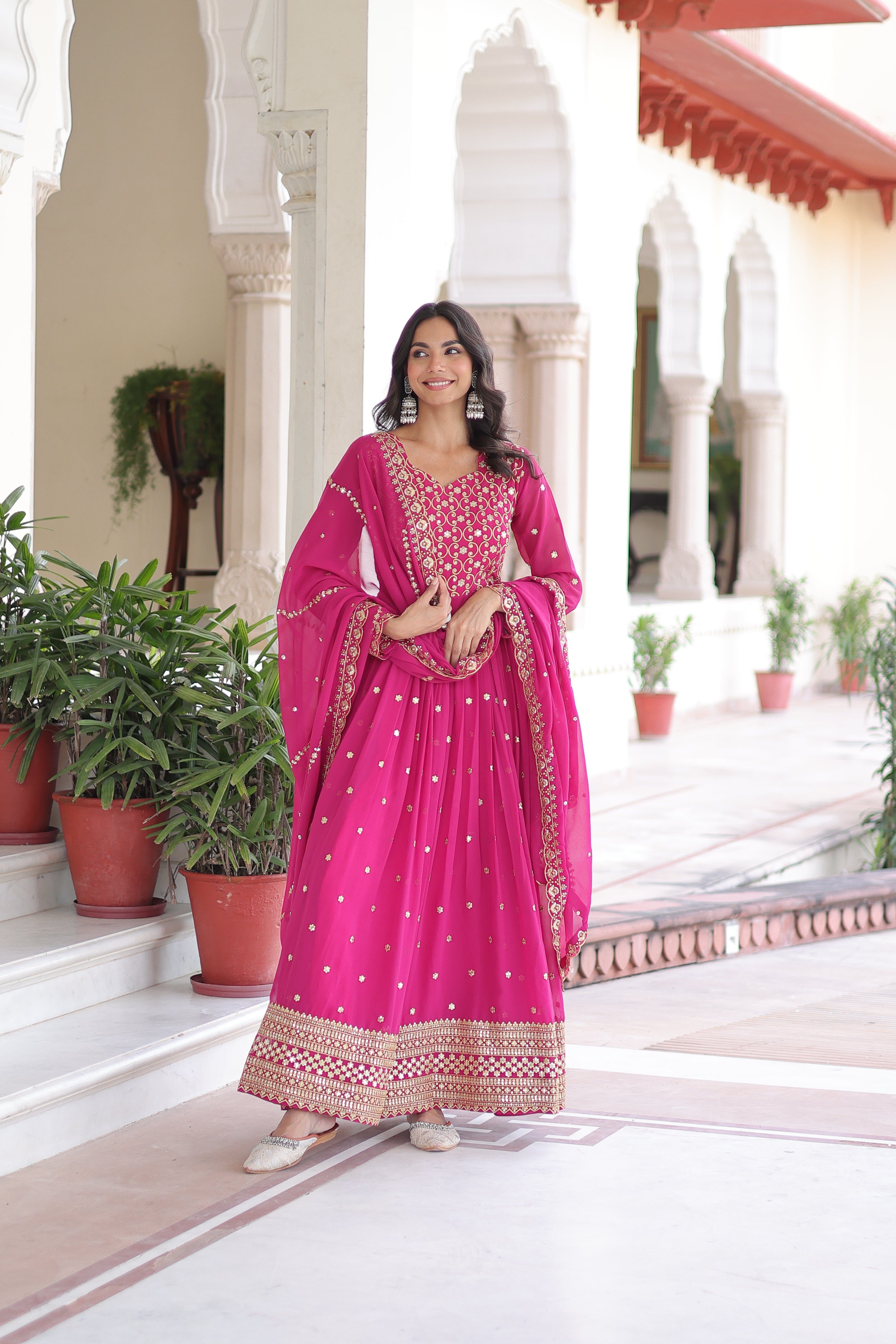 Aarini pink faux georgette gown with sequins zari embroidered work and dupatta