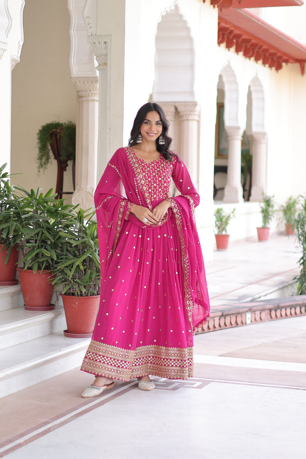 Aarini pink faux georgette gown with sequins zari embroidered work and dupatta