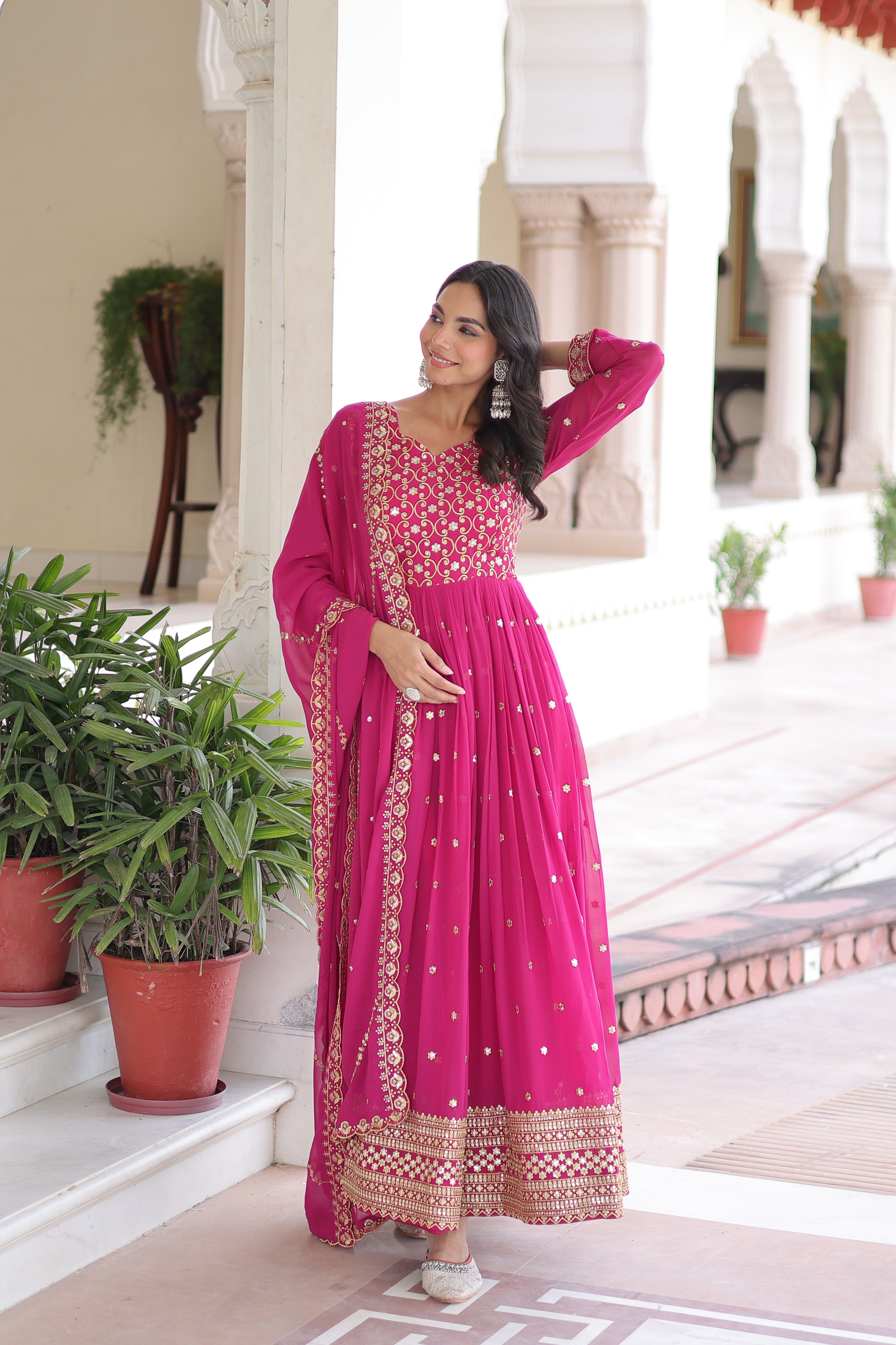 Aarini pink faux georgette gown with sequins zari embroidered work and dupatta