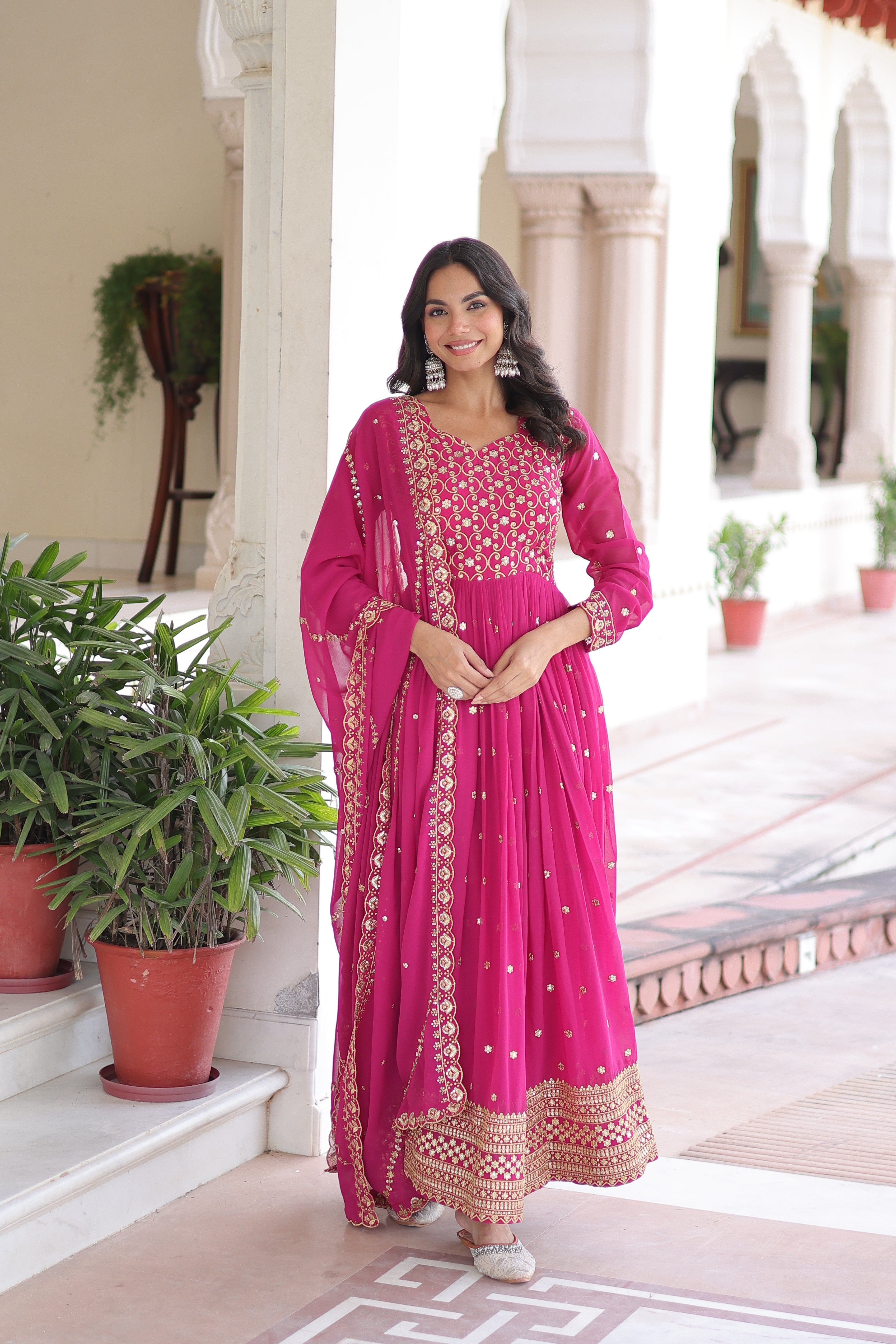 Aarini pink faux georgette gown with sequins zari embroidered work and dupatta