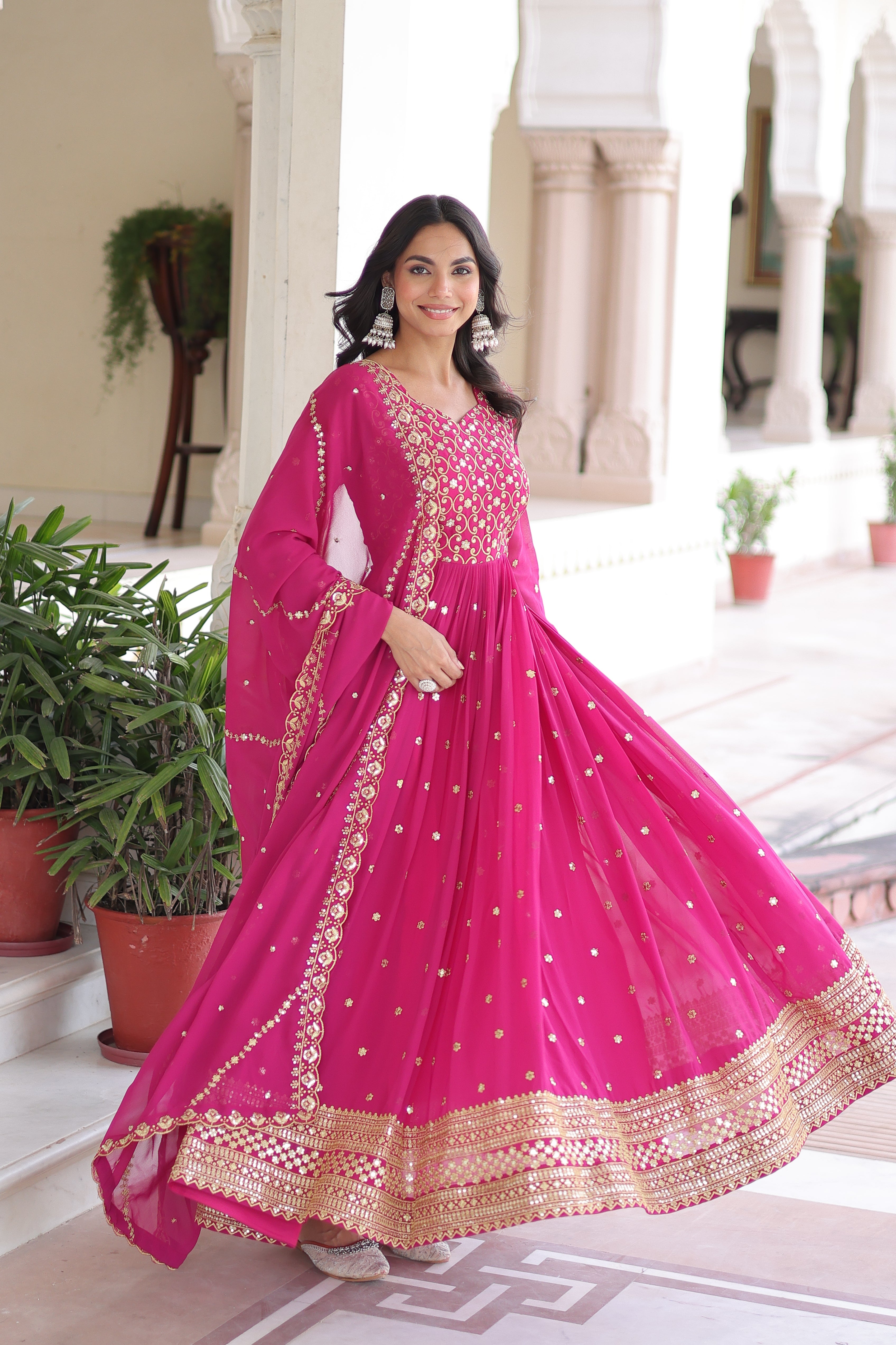 Aarini pink faux georgette gown with sequins zari embroidered work and dupatta