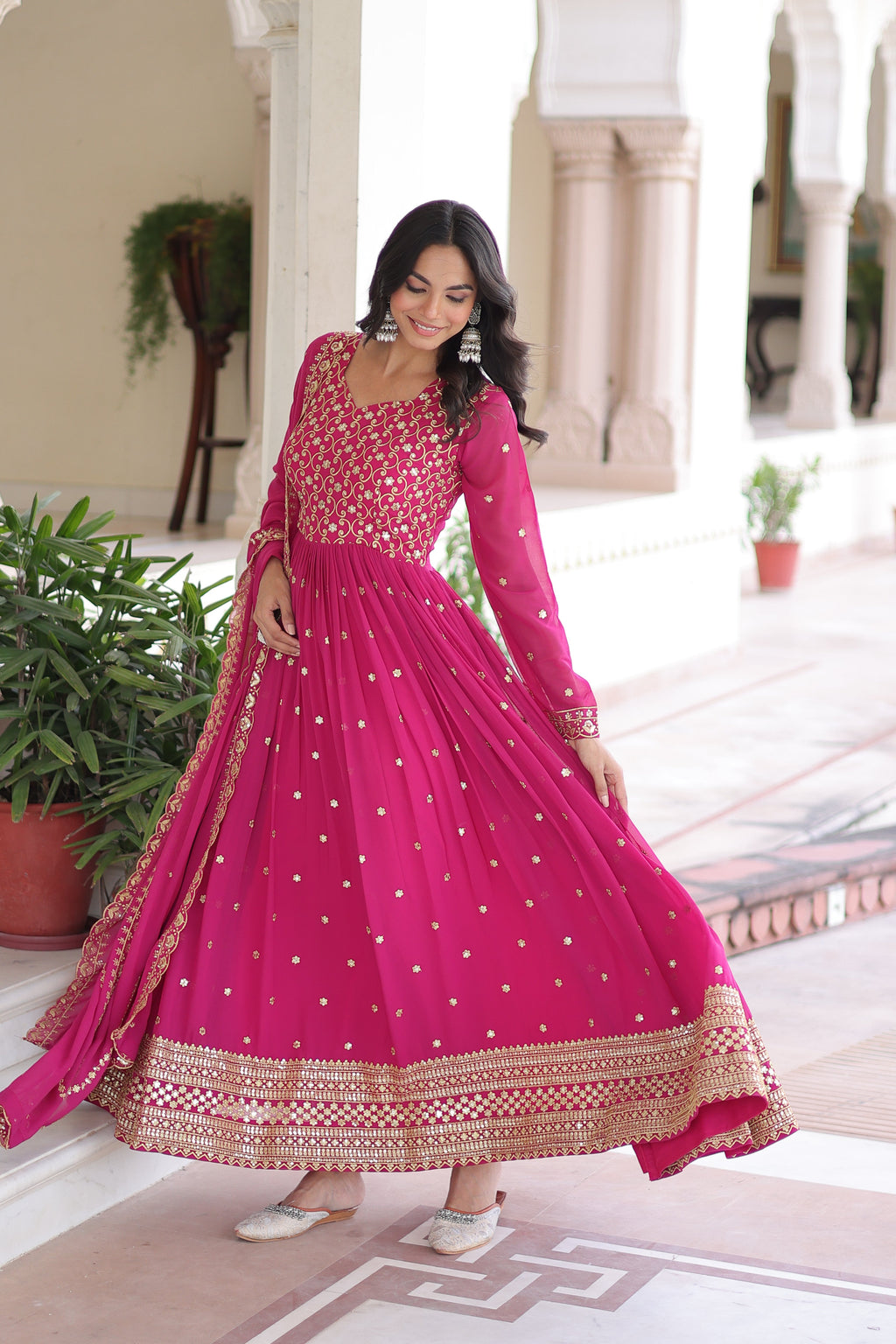 Aarini pink faux georgette gown with sequins zari embroidered work and dupatta