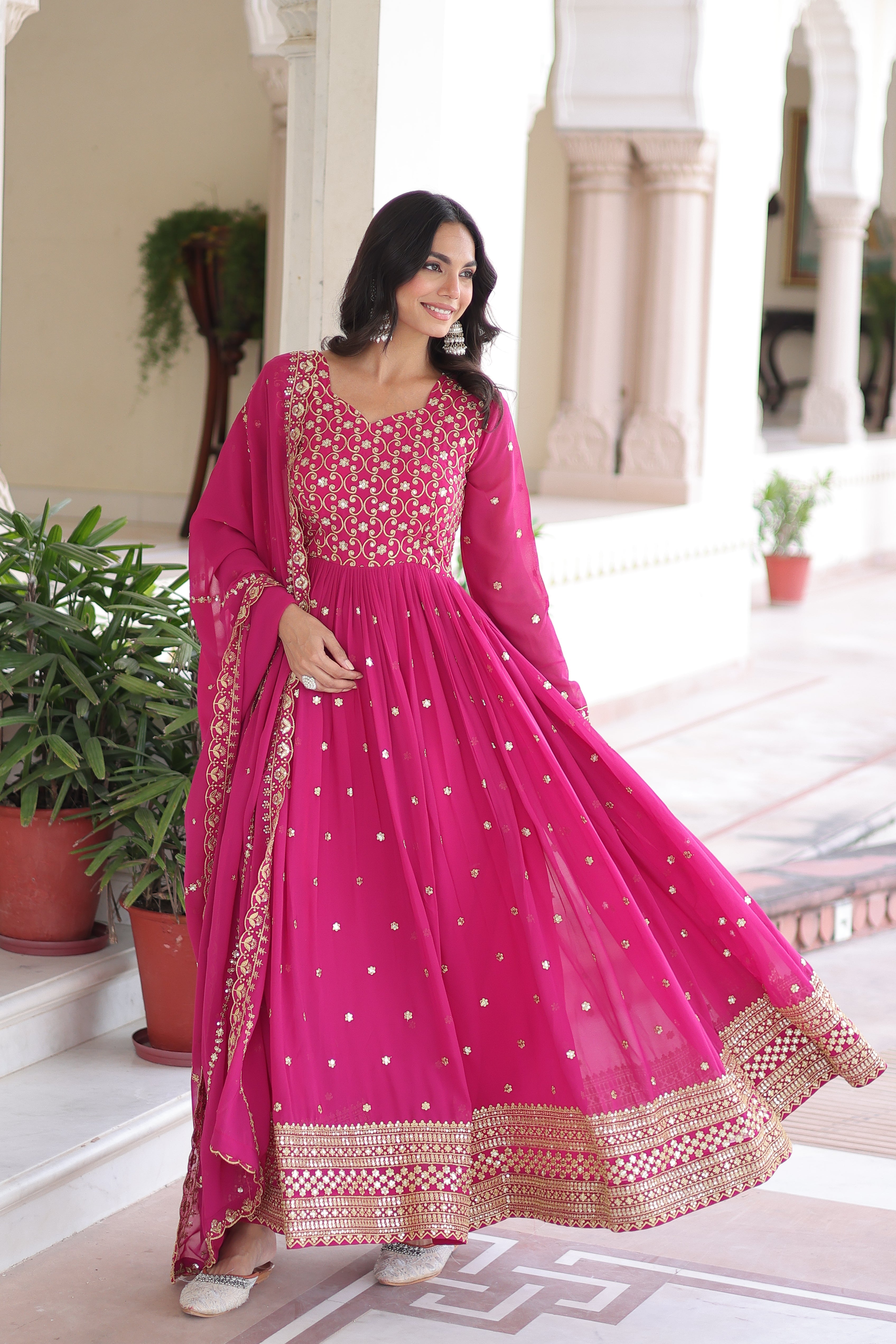 Aarini pink faux georgette gown with sequins zari embroidered work and dupatta