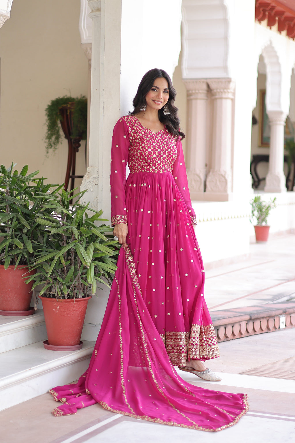 Aarini pink faux georgette gown with sequins zari embroidered work and dupatta