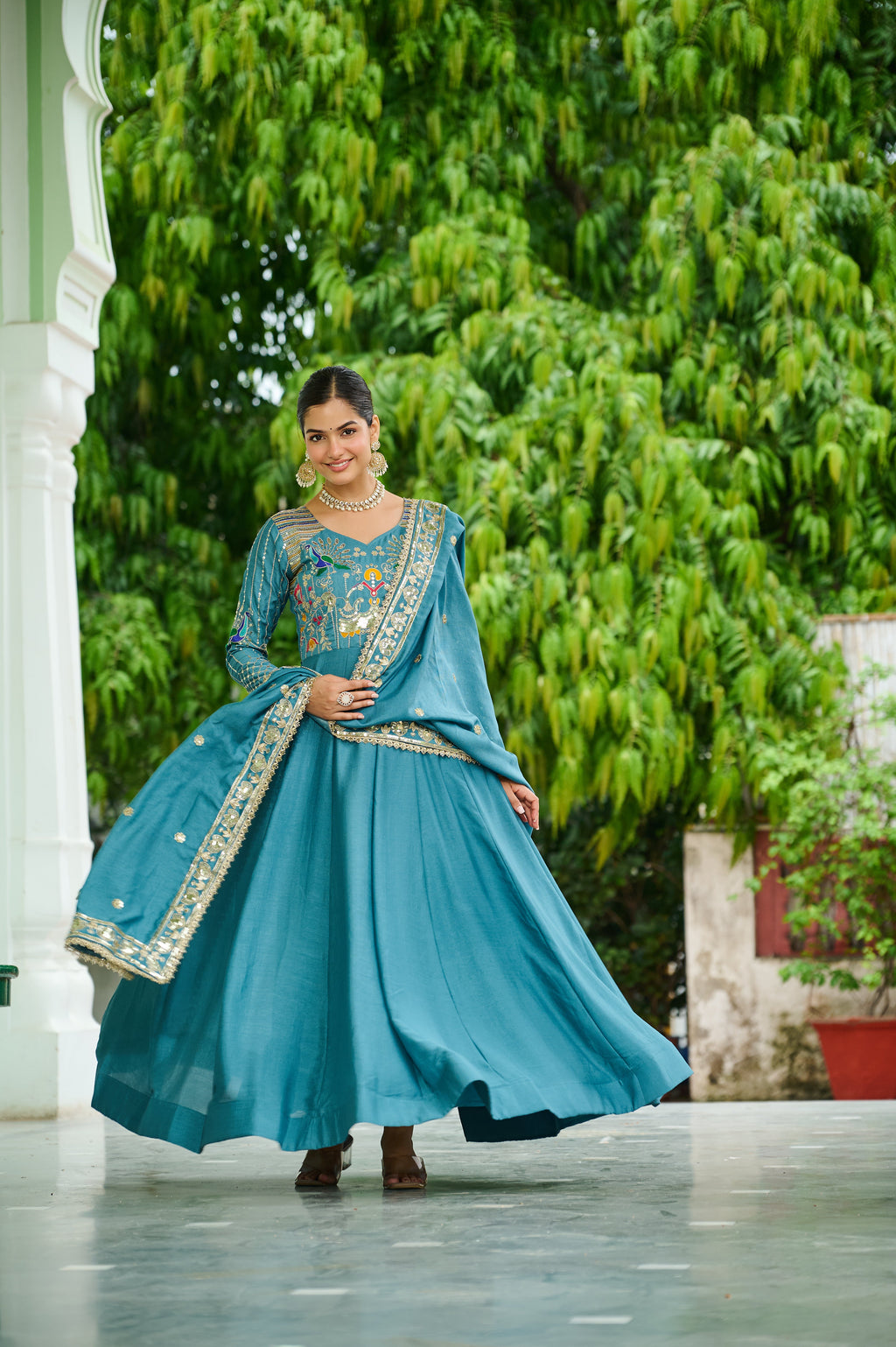 Ruvani sky blue Vichitra silk gown with sequins multi thread zari embroidery and dupatta