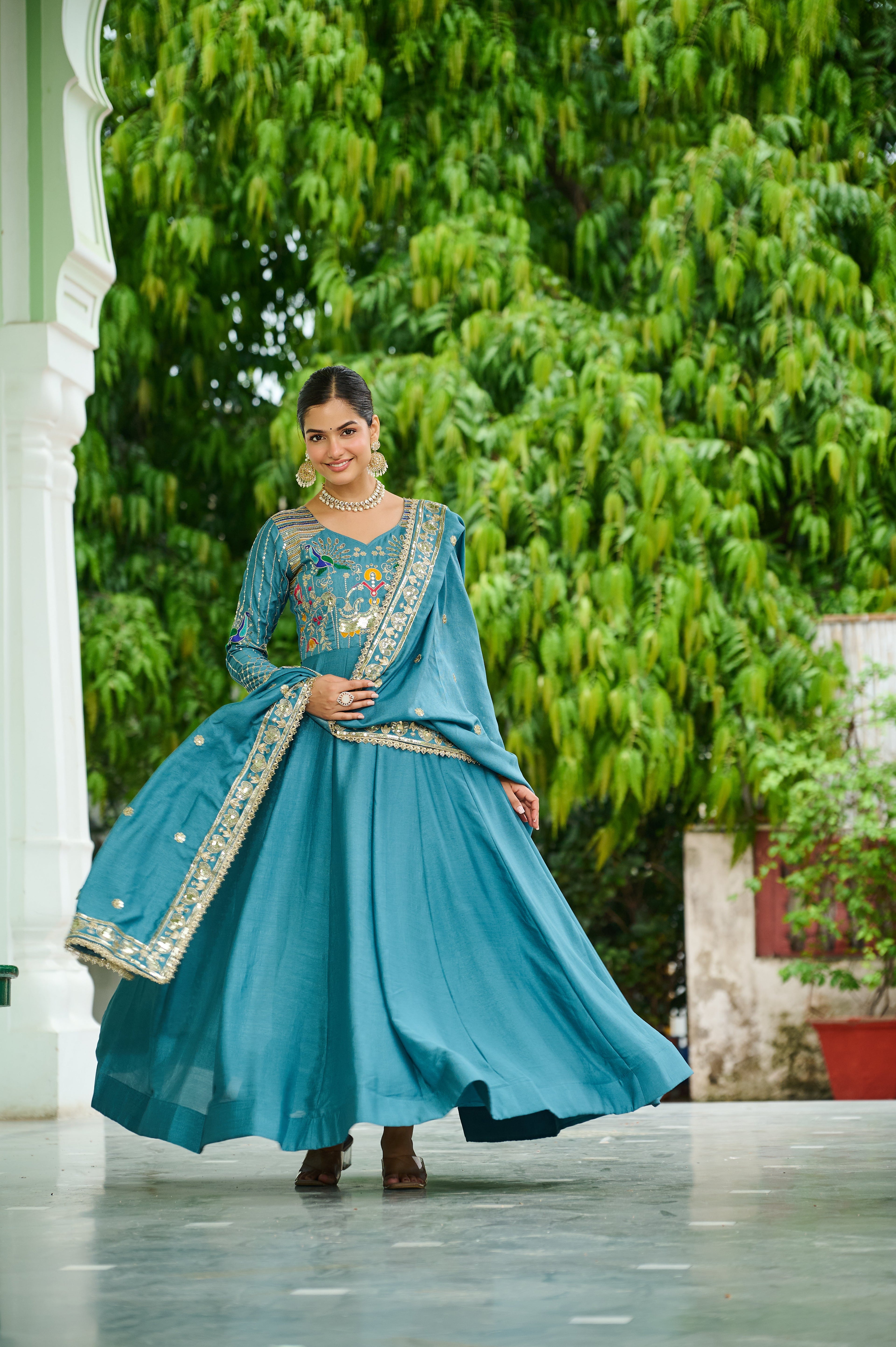 Ruvani sky blue Vichitra silk gown with sequins multi thread zari embroidery and dupatta