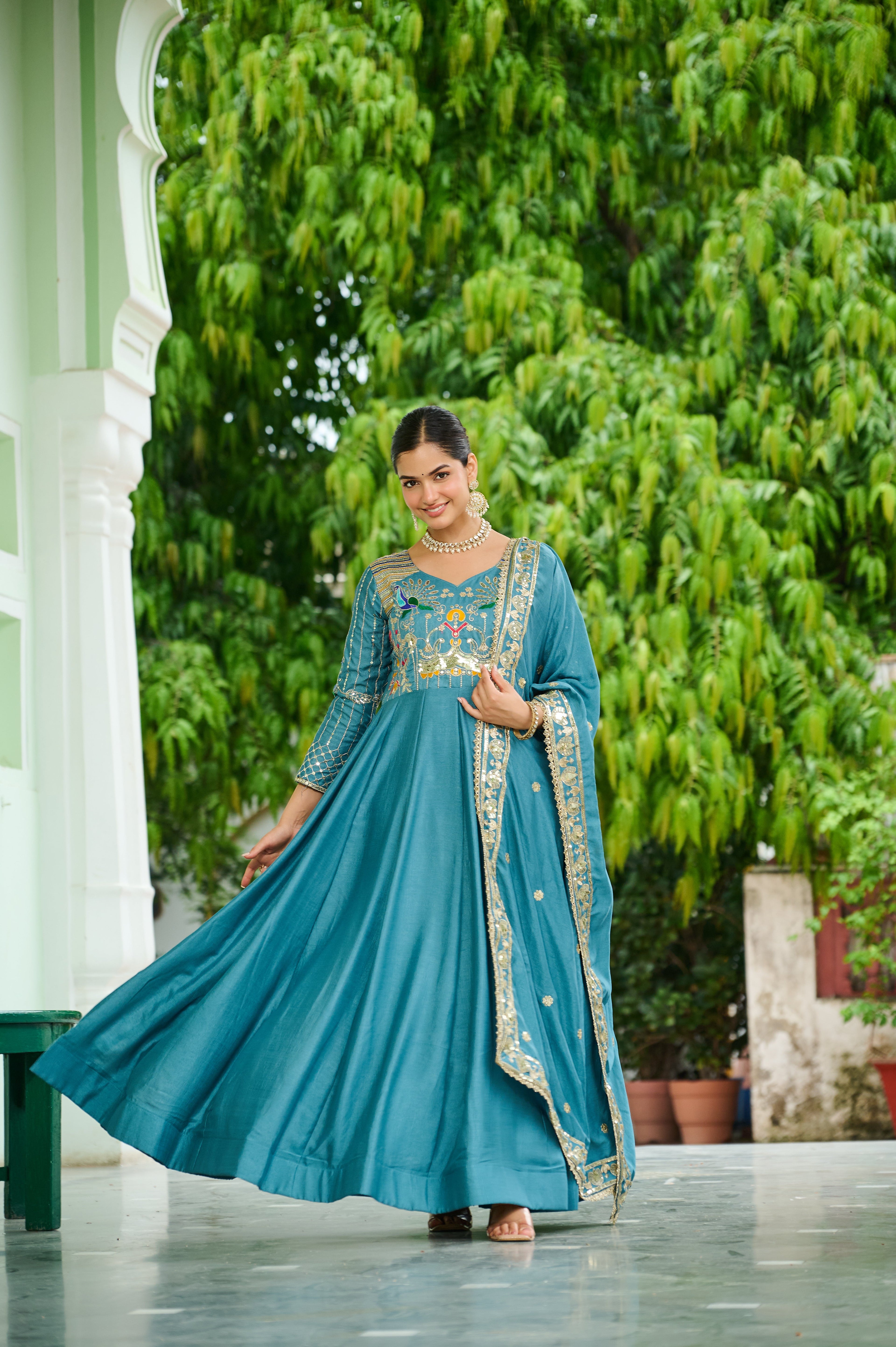 Ruvani sky blue Vichitra silk gown with sequins multi thread zari embroidery and dupatta