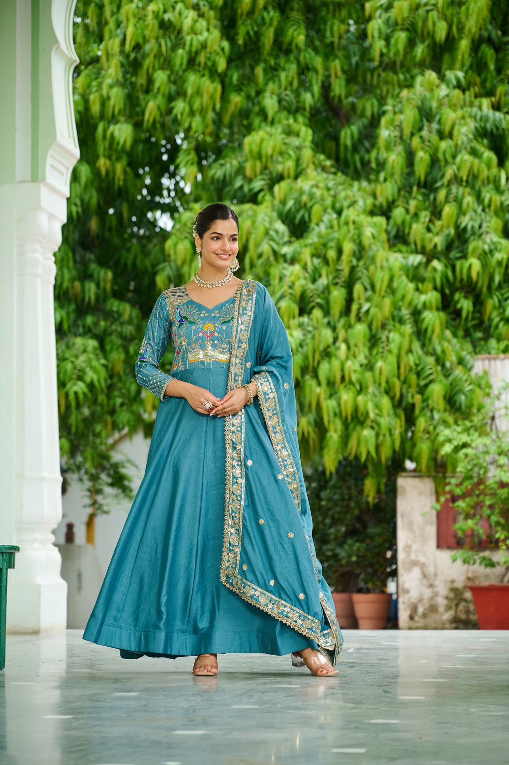 Ruvani sky blue Vichitra silk gown with sequins multi thread zari embroidery and dupatta