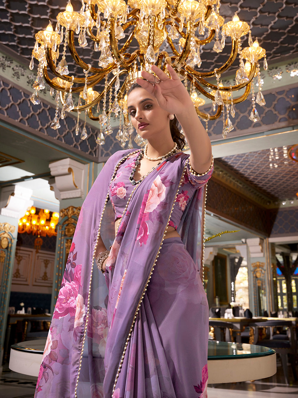 Lavender georgette printed saree with pearl lace border