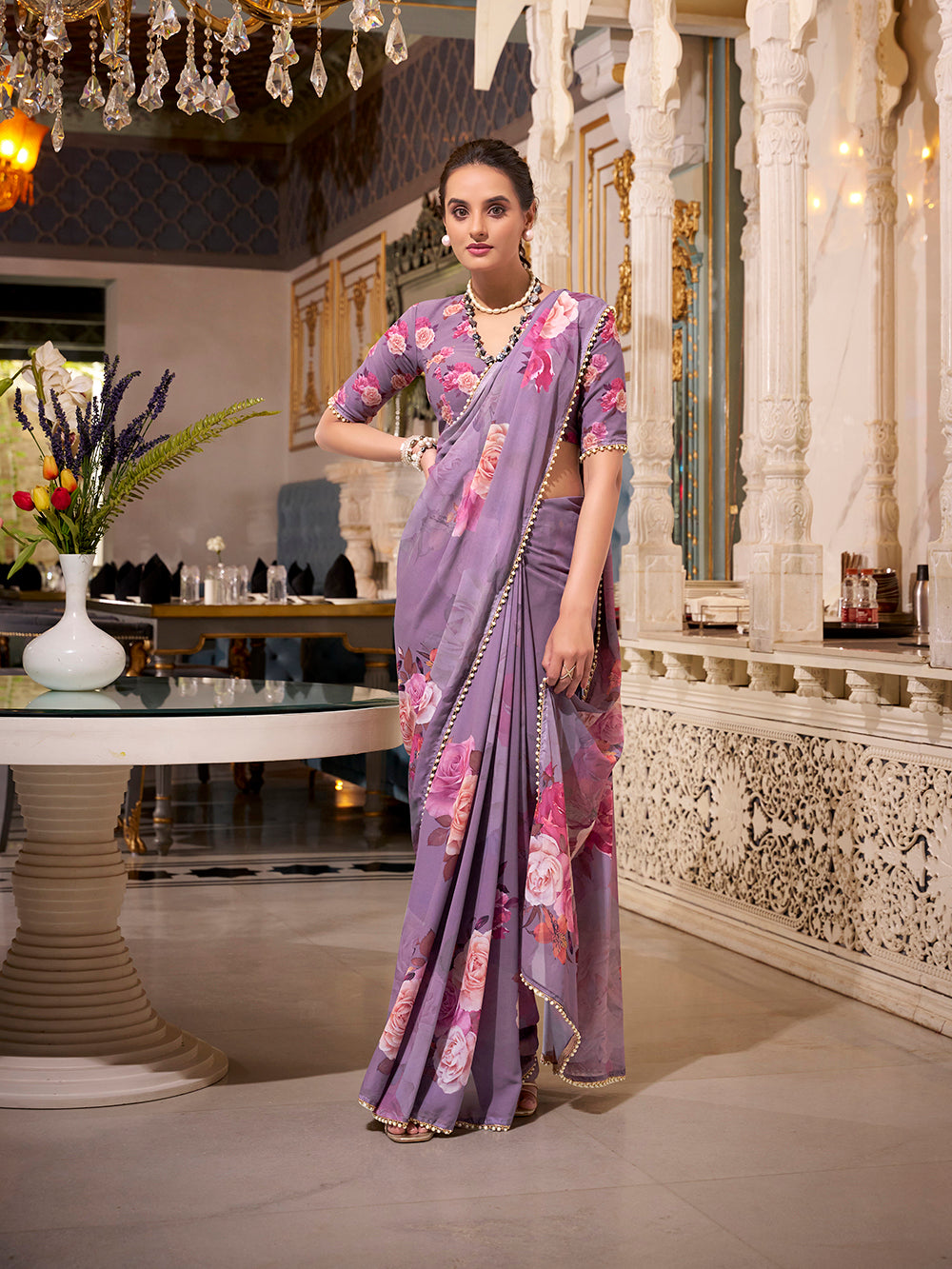 Lavender georgette printed saree with pearl lace border