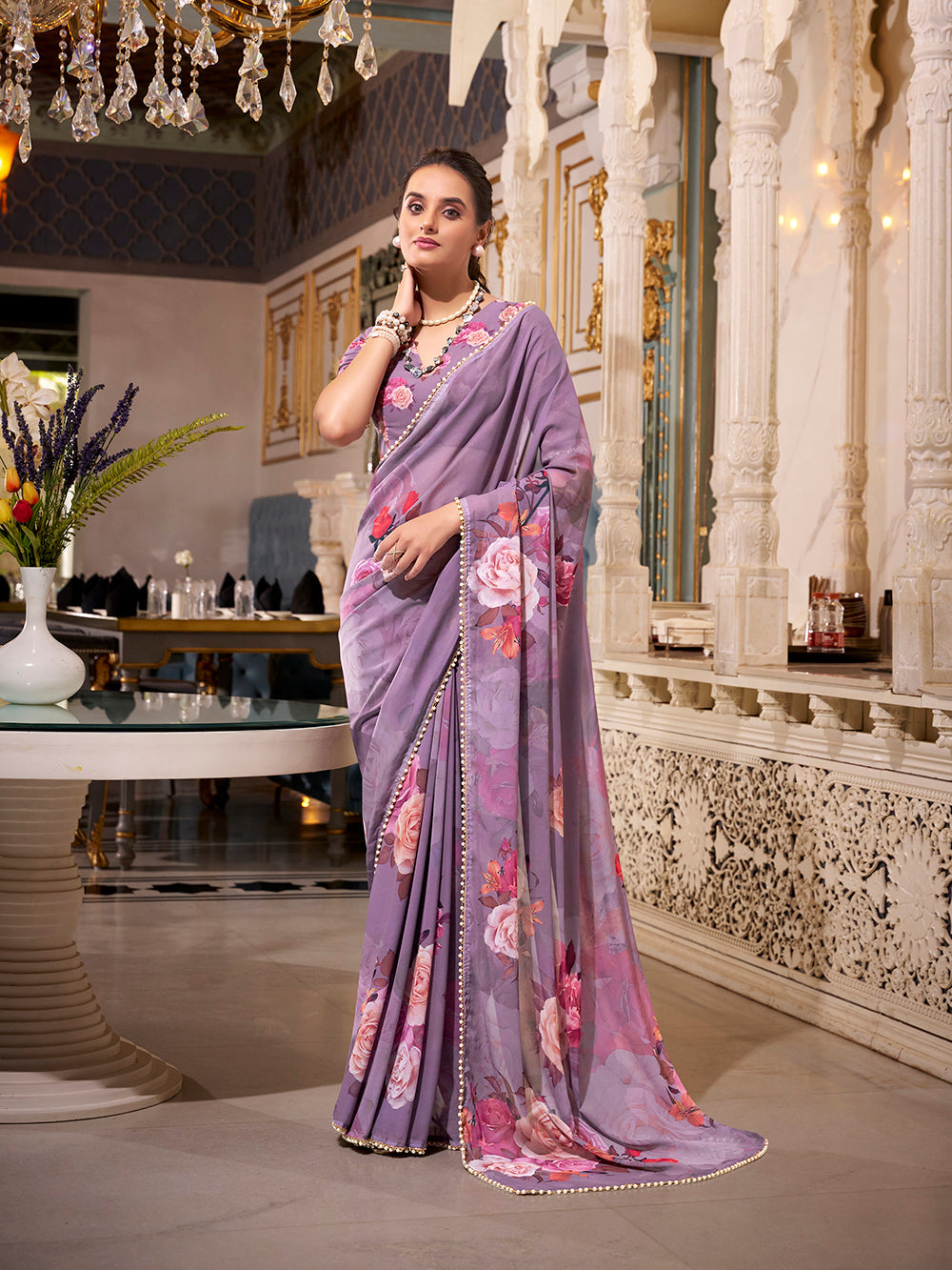 Lavender georgette printed saree with pearl lace border