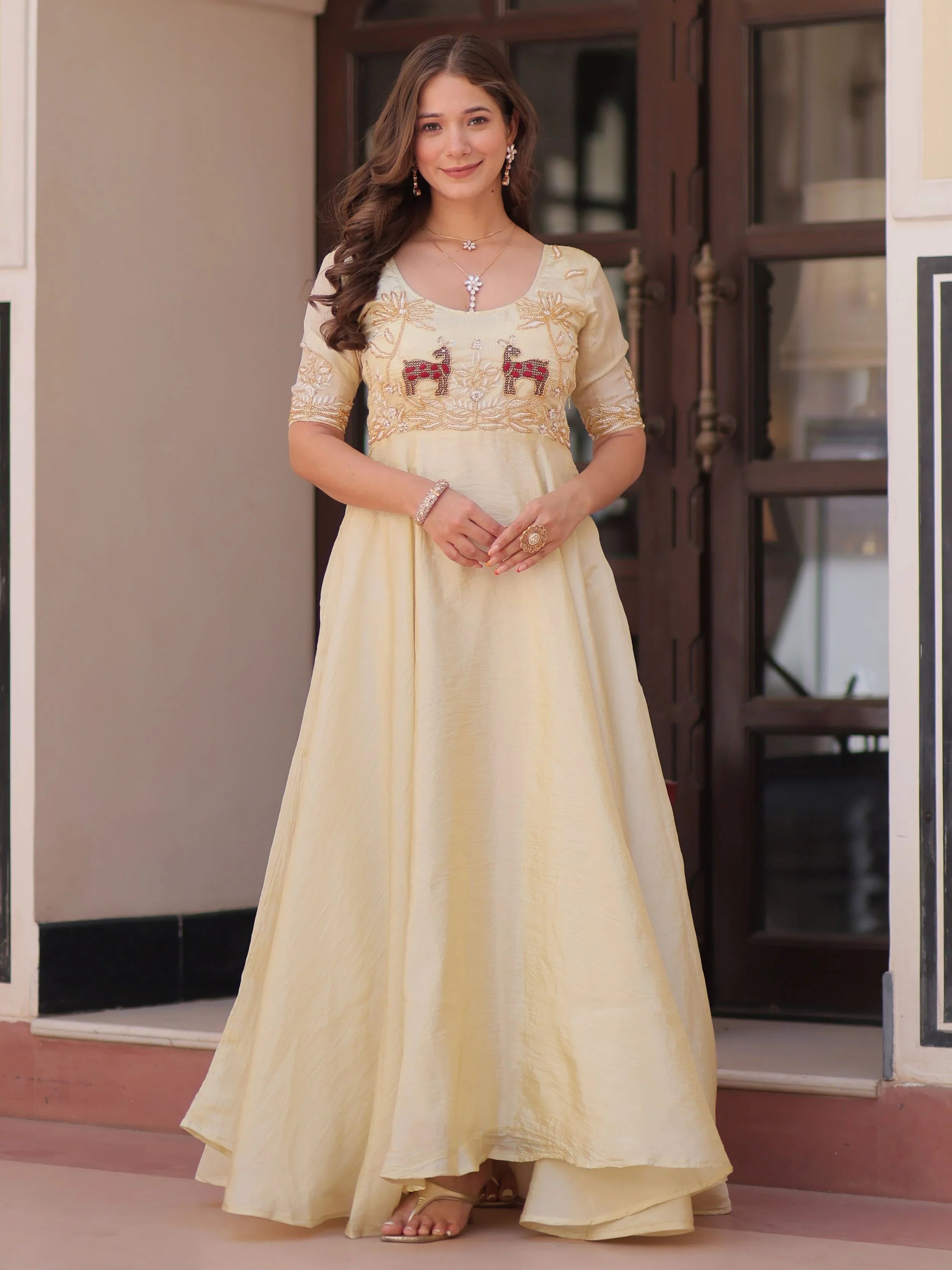 Light yellow gold crush umbrella flair gown with beads embroidery