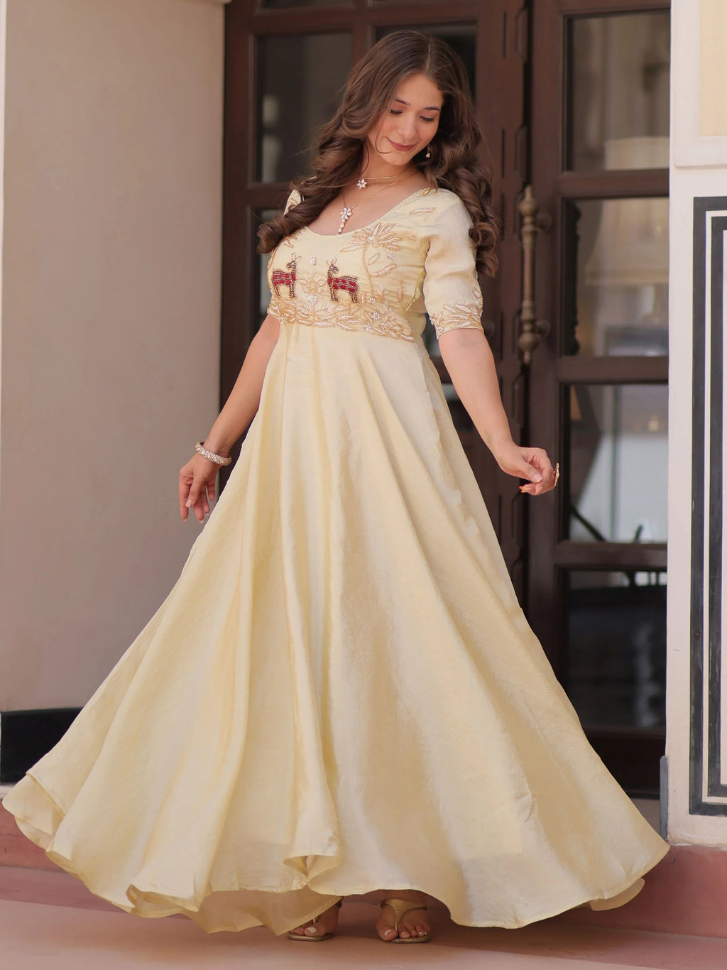 Light yellow gold crush umbrella flair gown with beads embroidery