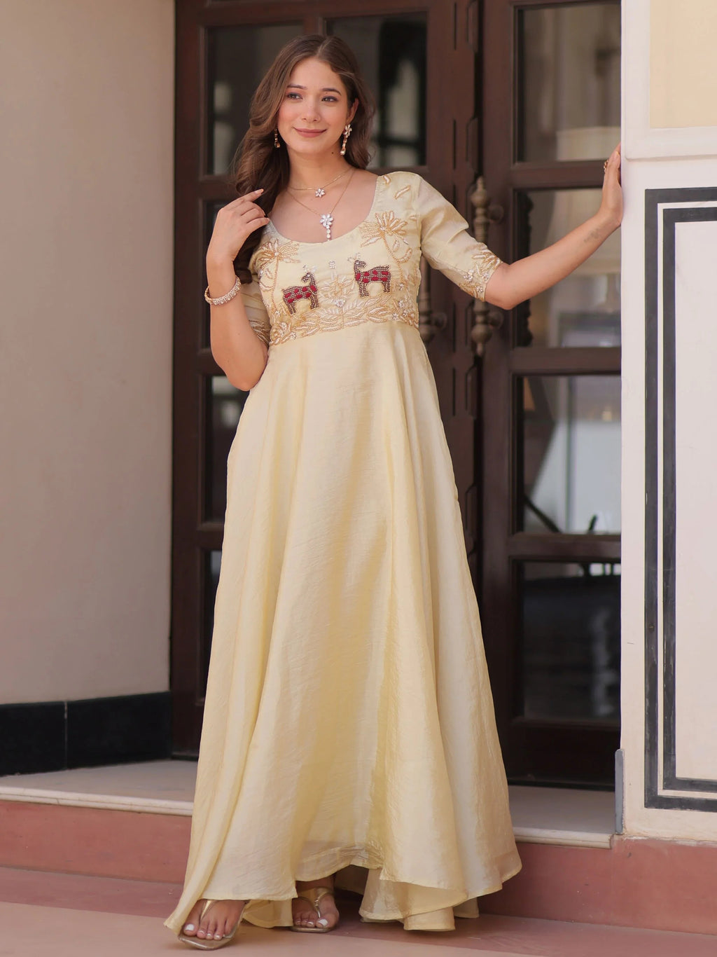 Light yellow gold crush umbrella flair gown with beads embroidery