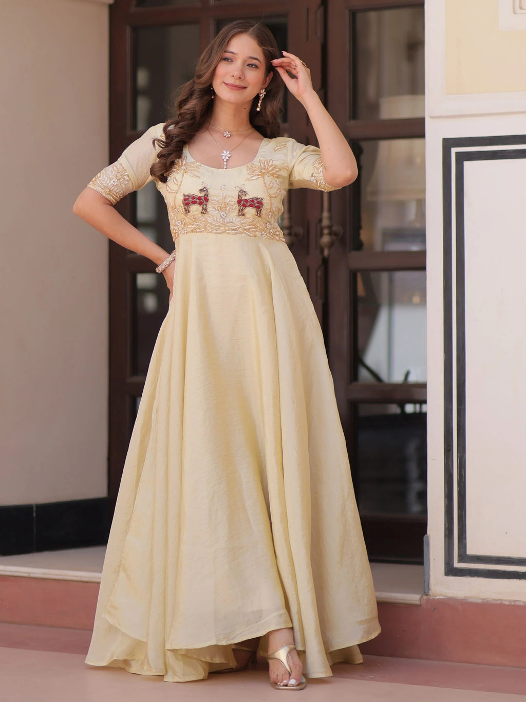 Light yellow gold crush umbrella flair gown with beads embroidery