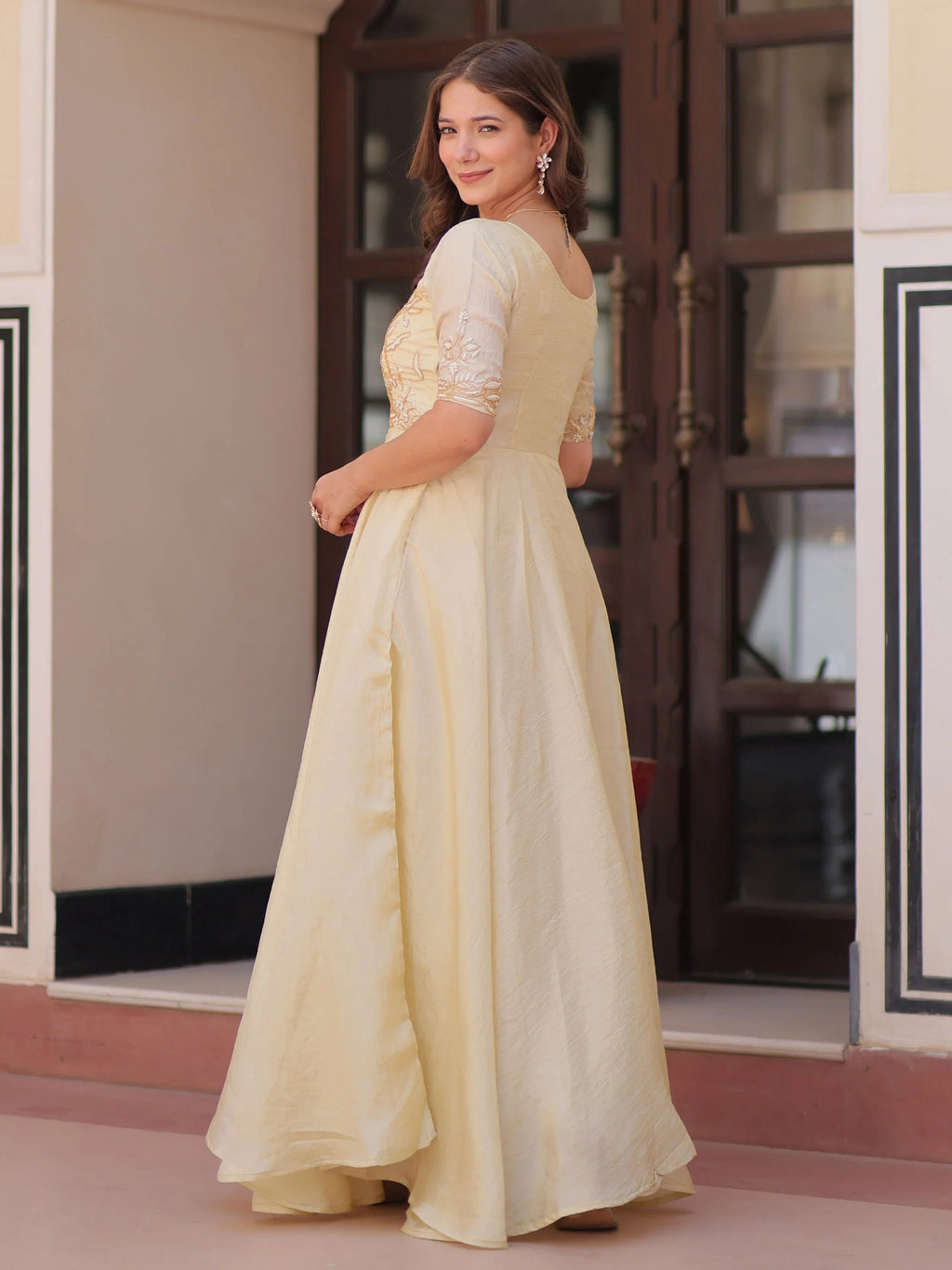 Light yellow gold crush umbrella flair gown with beads embroidery