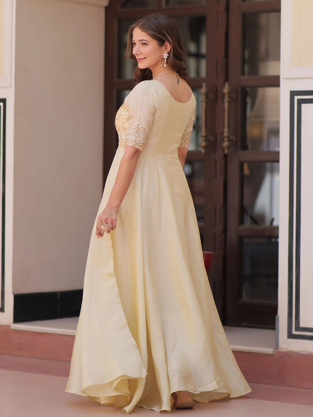 Light yellow gold crush umbrella flair gown with beads embroidery