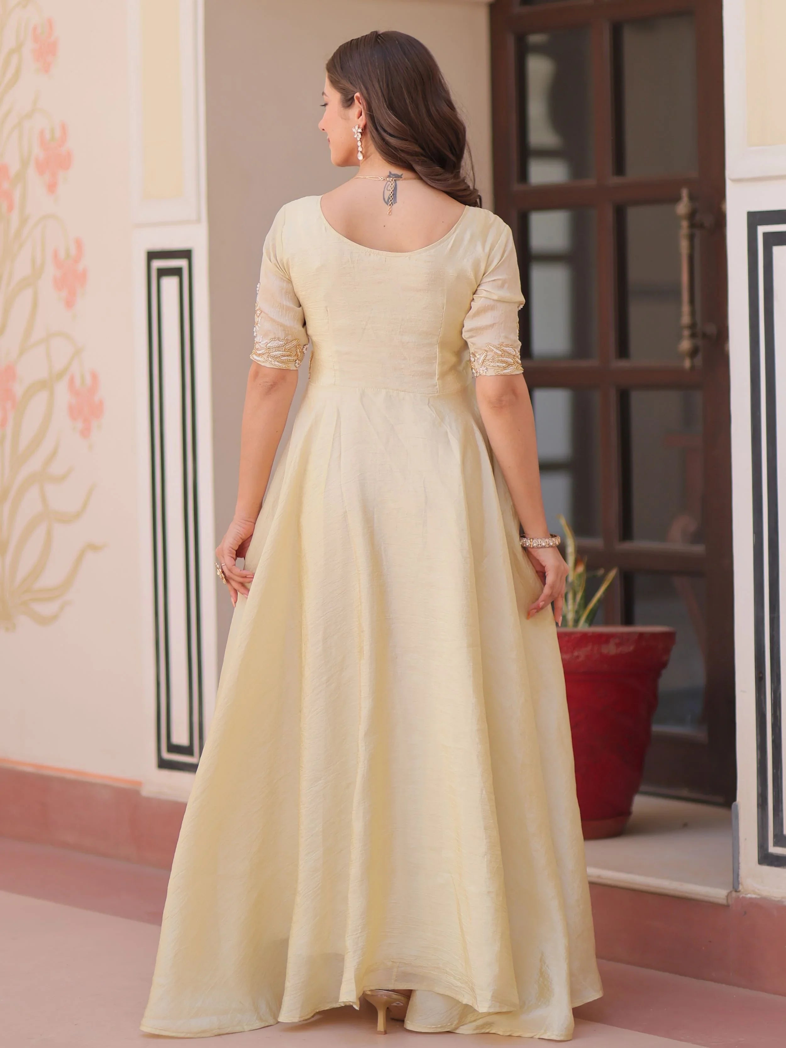 Light yellow gold crush umbrella flair gown with beads embroidery