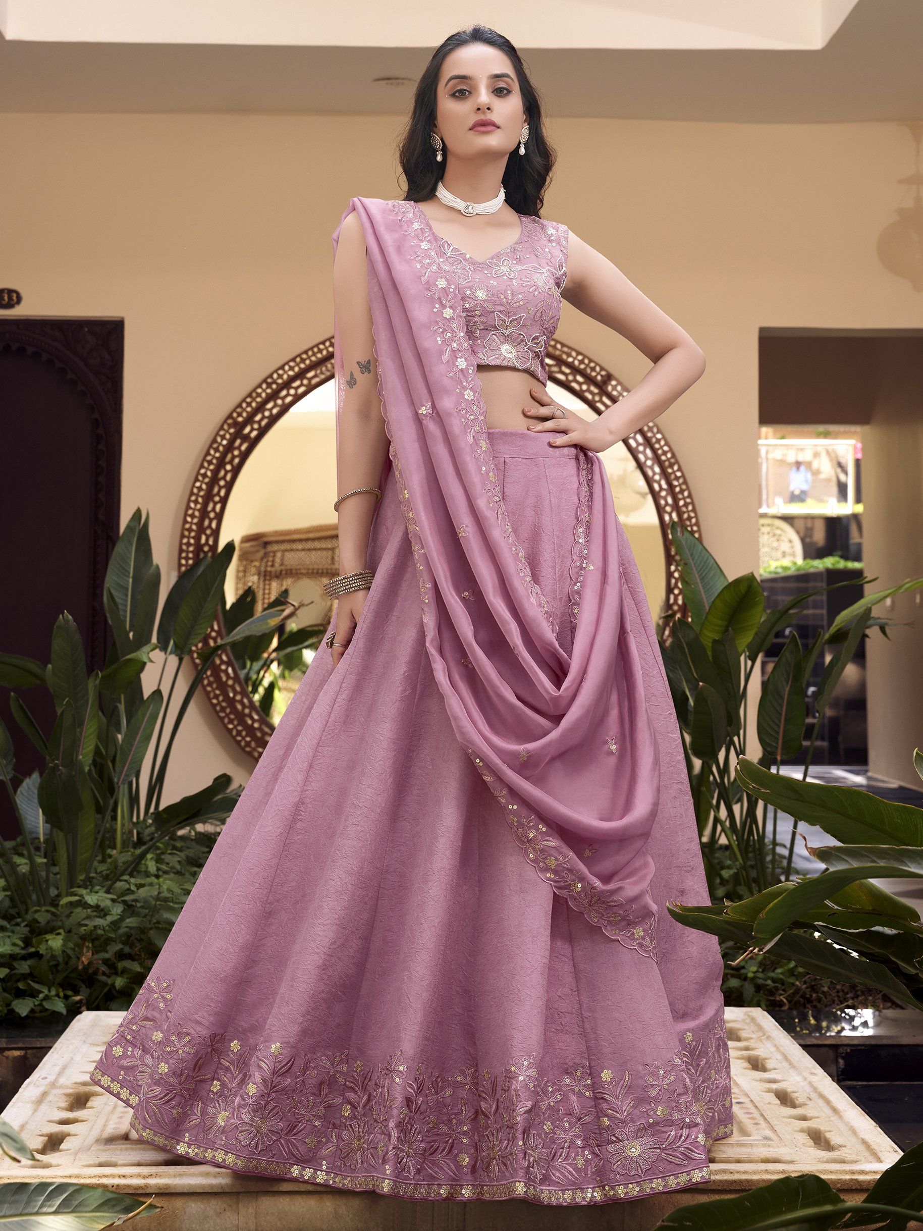 Mauve pink organza lehenga choli with pearl coding and sequins embroidery