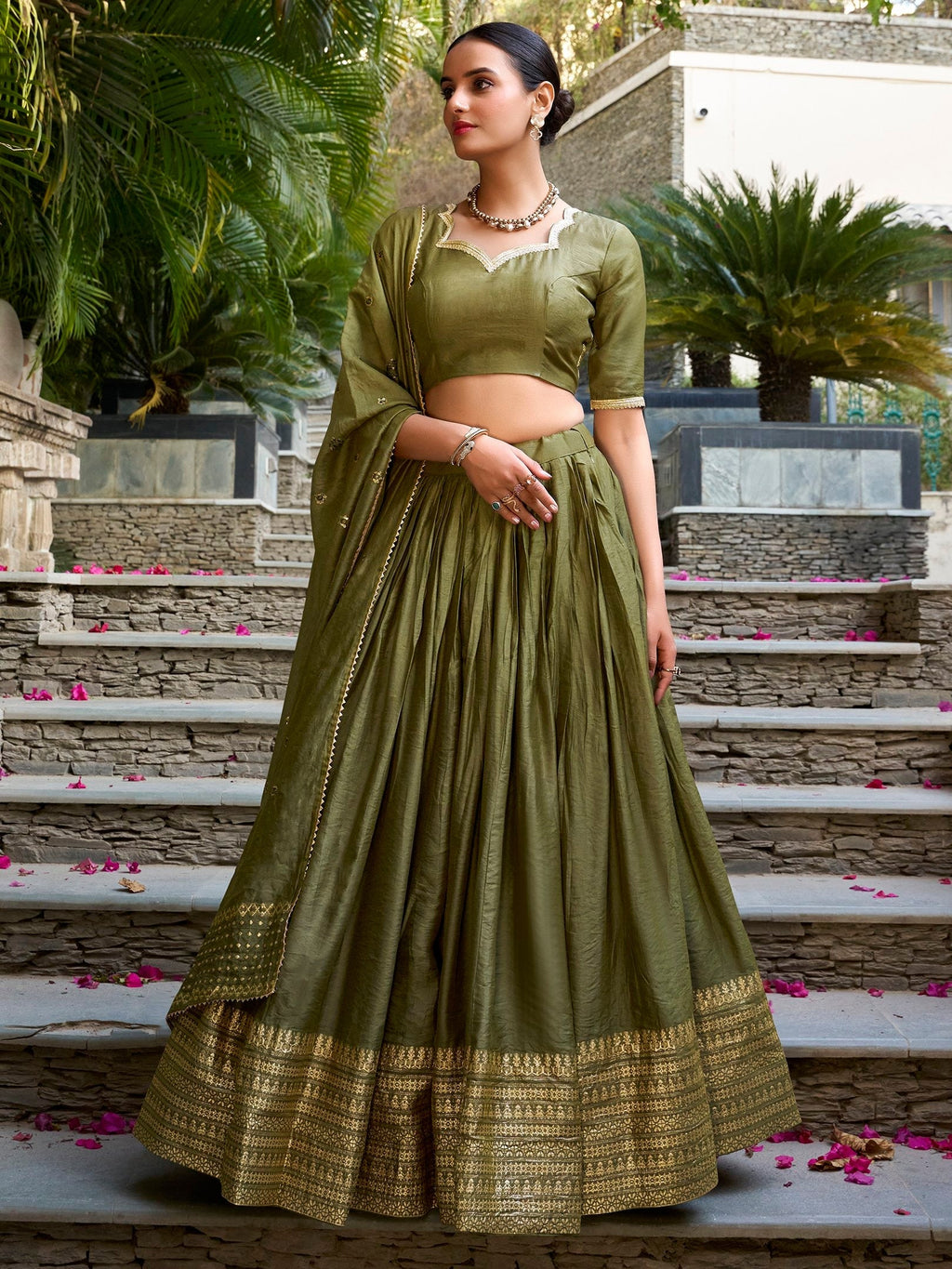 Mehendi green pure chanderi lehenga choli with plain zari weaving