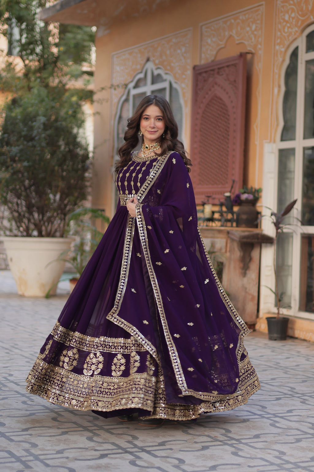 Moumita purple embroidered anarkali gown set