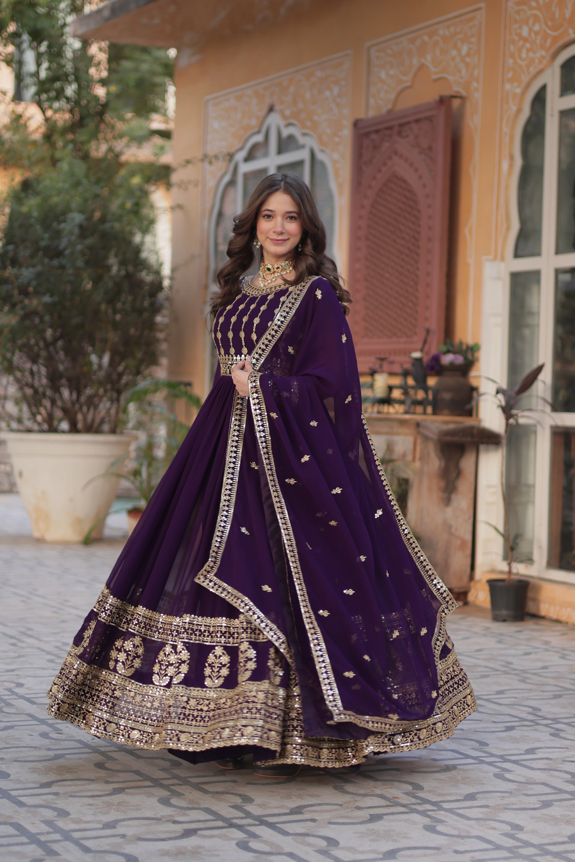Moumita purple embroidered anarkali gown set