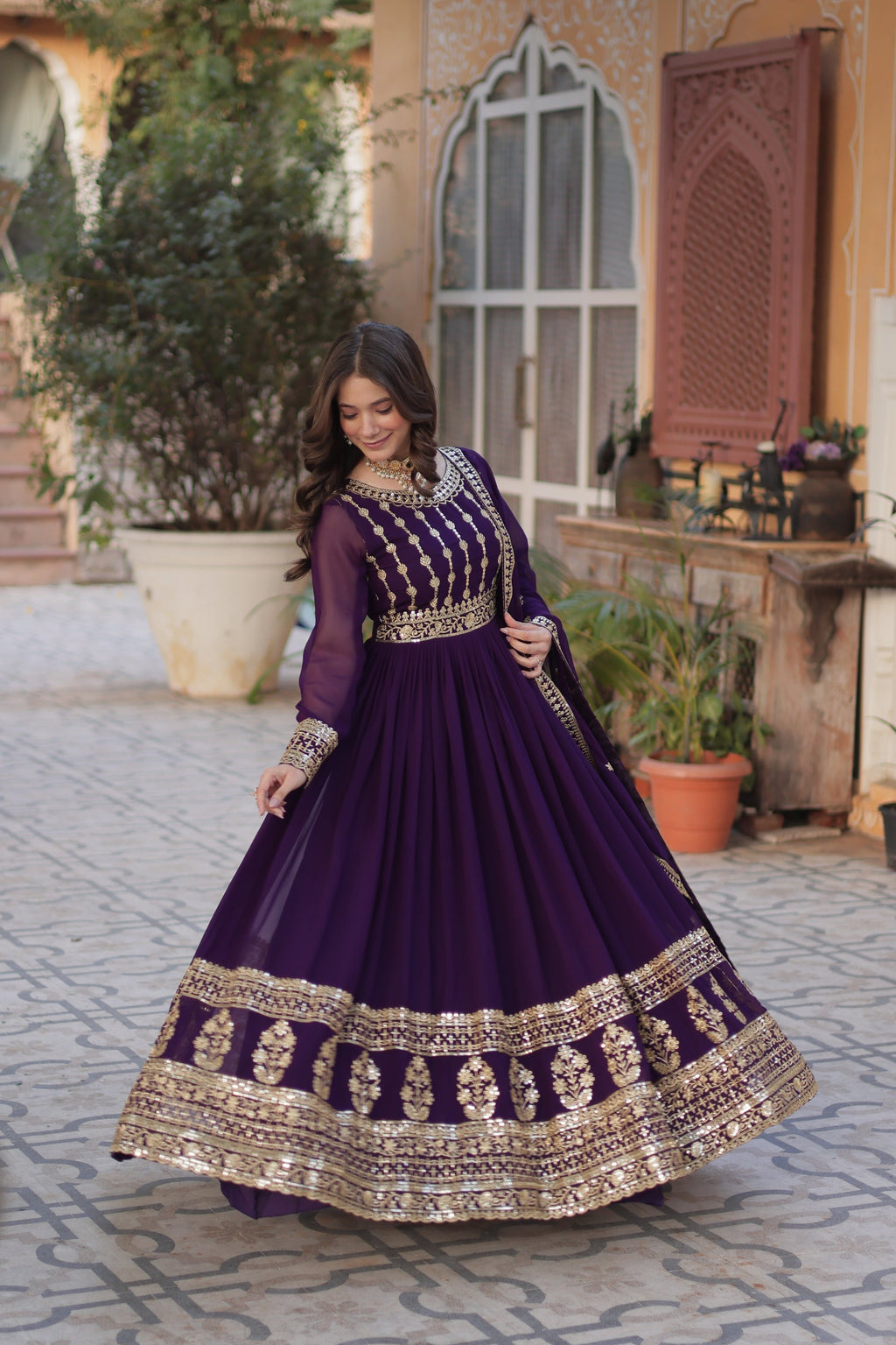 Moumita purple embroidered anarkali gown set
