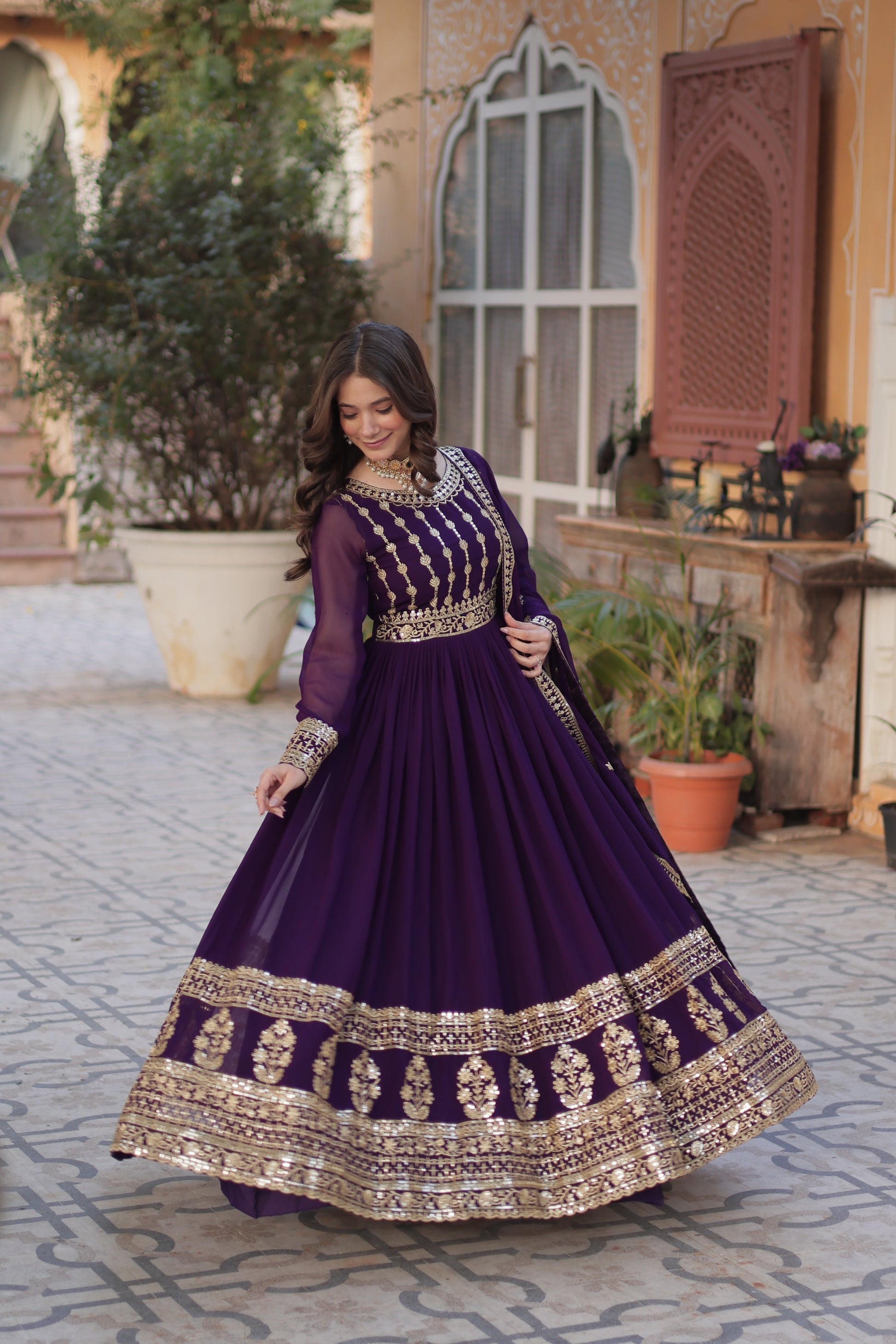 Moumita purple embroidered anarkali gown set