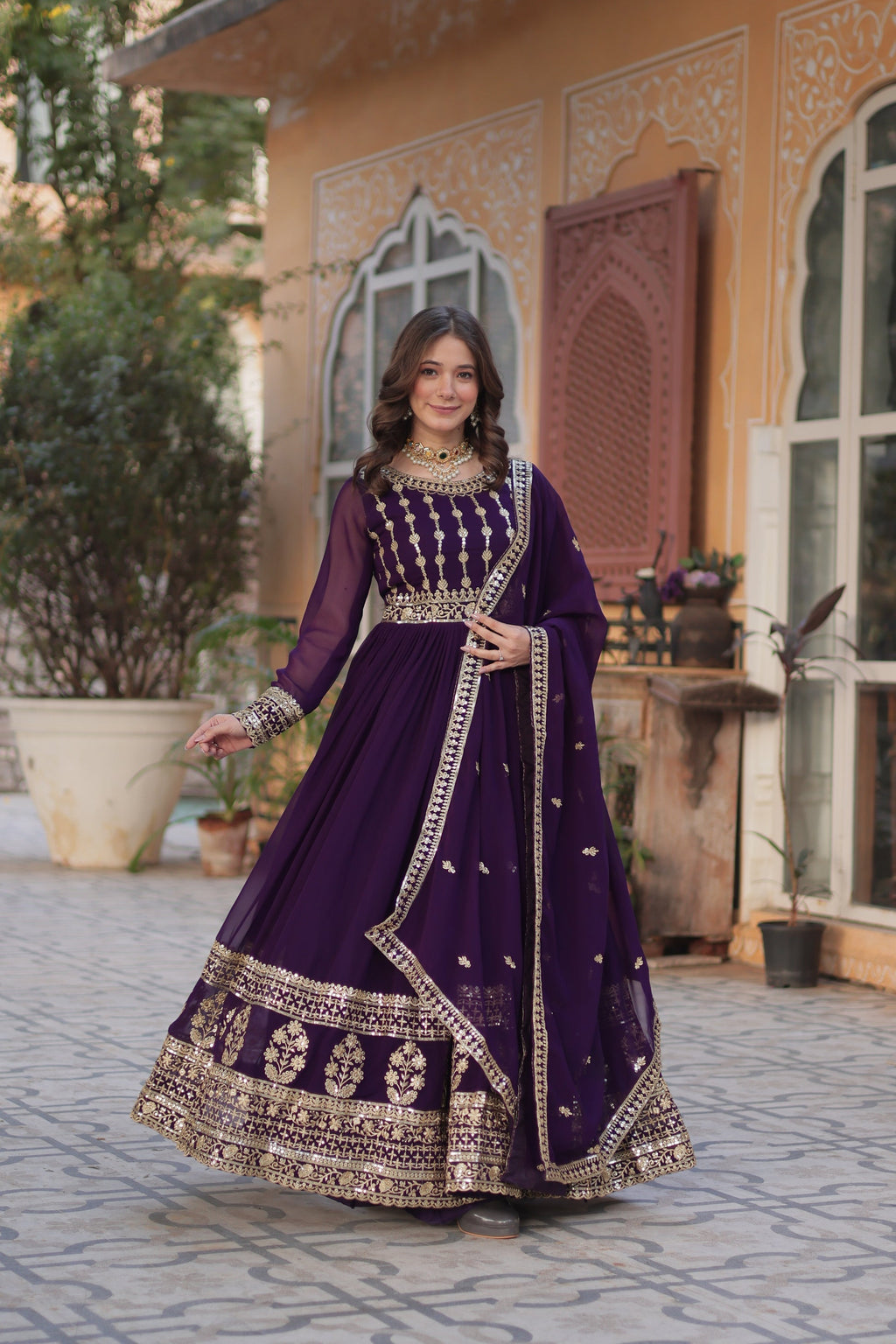 Moumita purple embroidered anarkali gown set