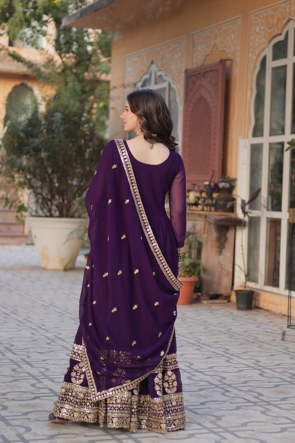 Moumita purple embroidered anarkali gown set