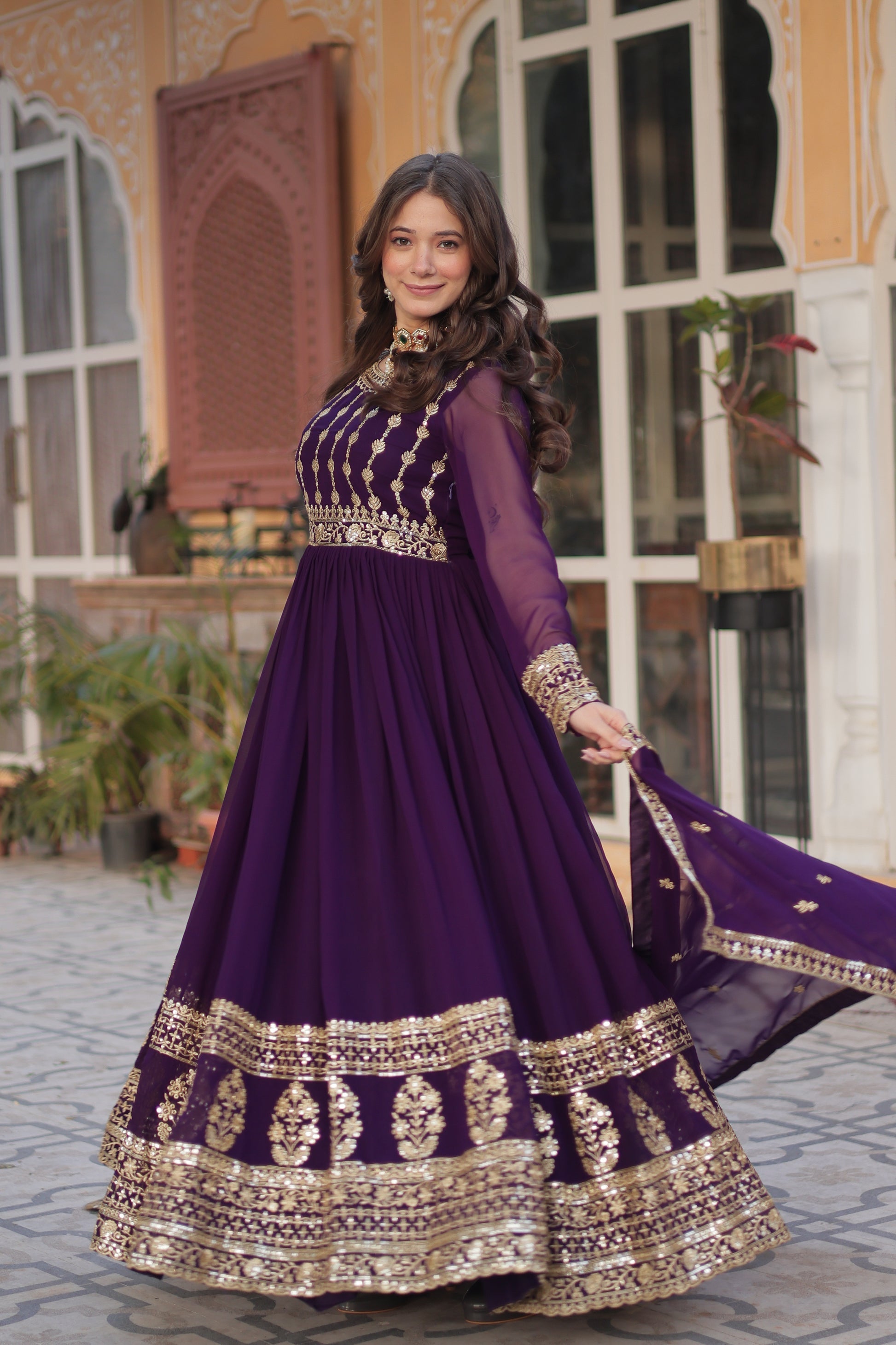 Moumita purple embroidered anarkali gown set