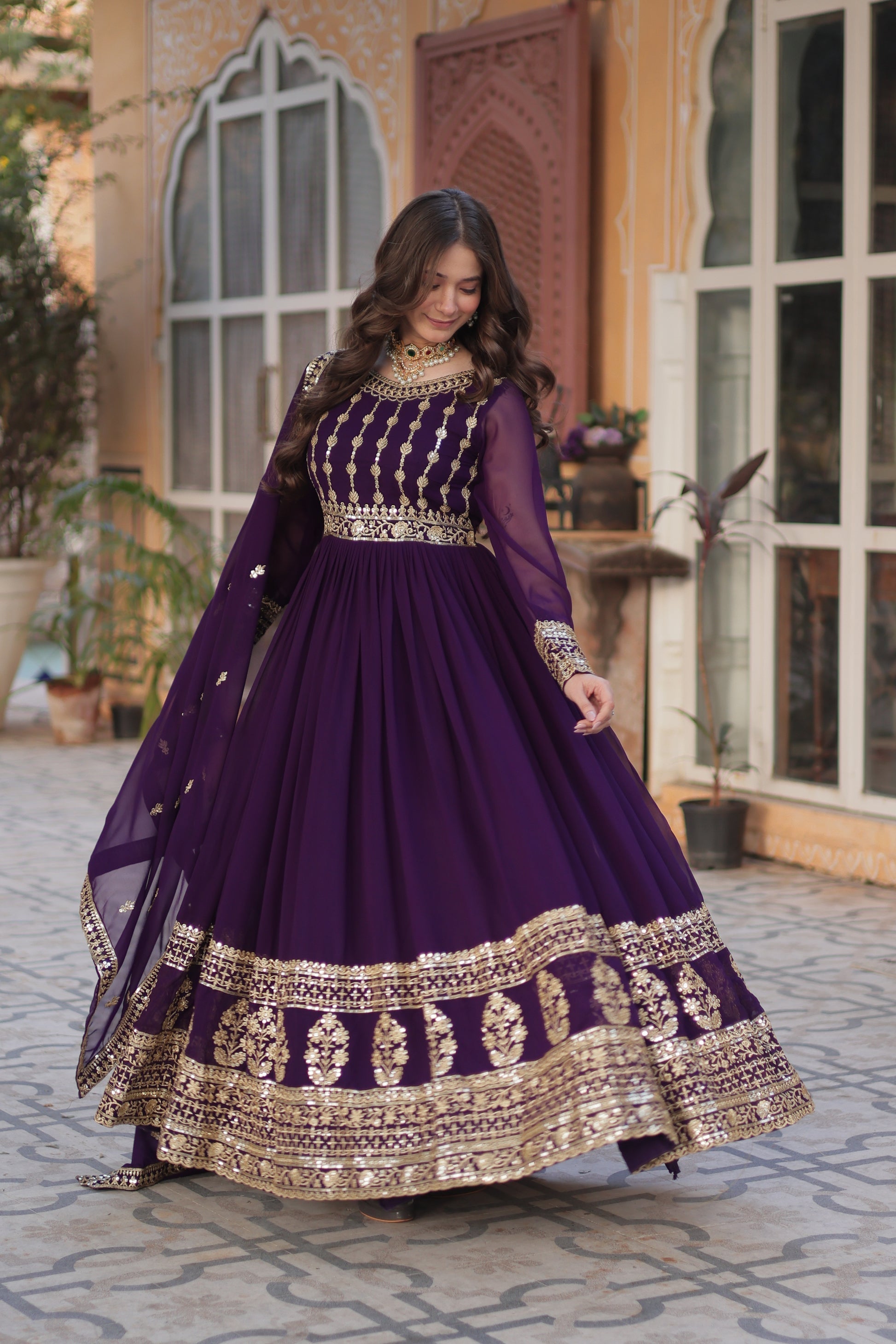 Moumita purple embroidered anarkali gown set