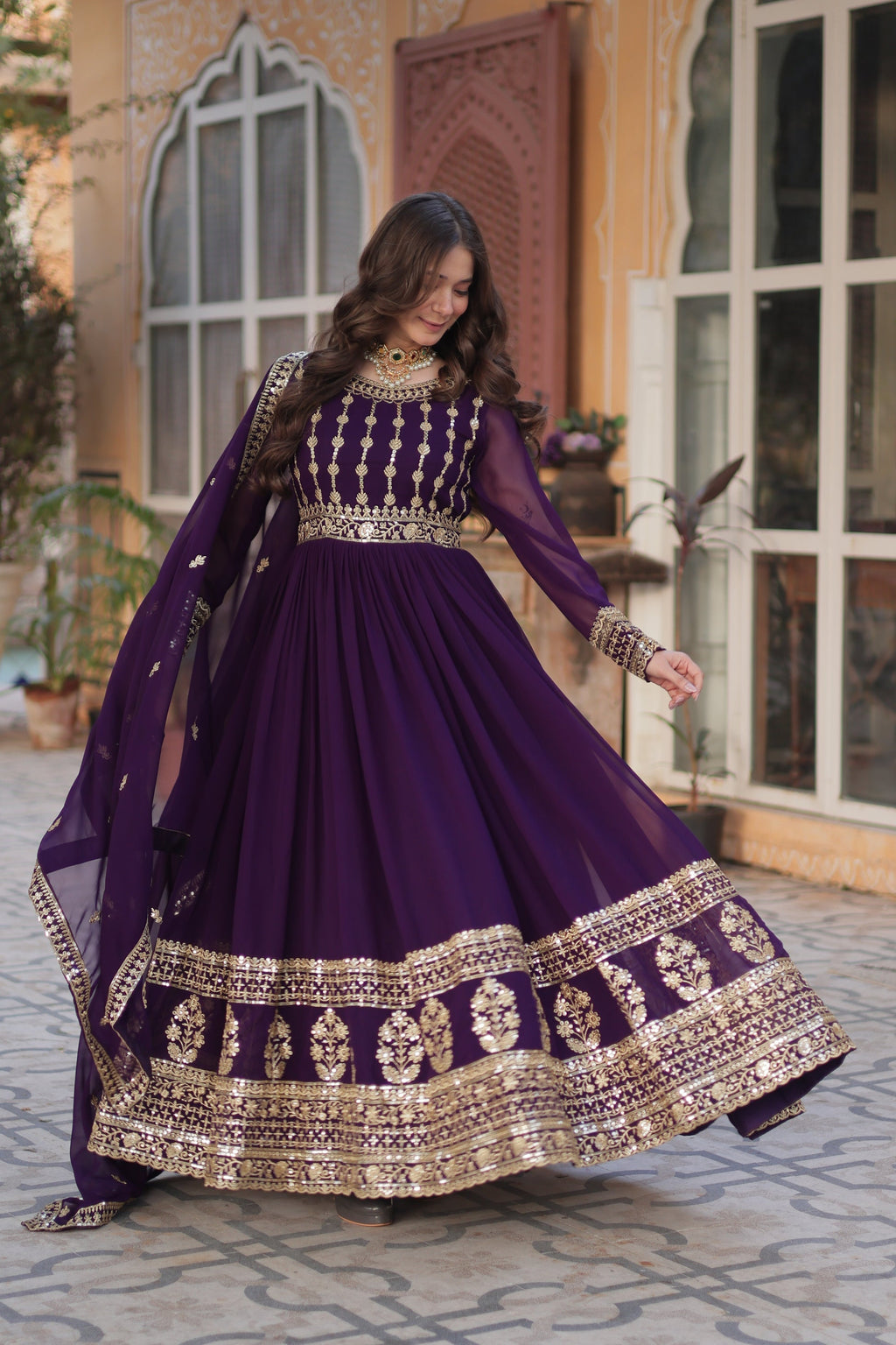 Moumita purple embroidered anarkali gown set